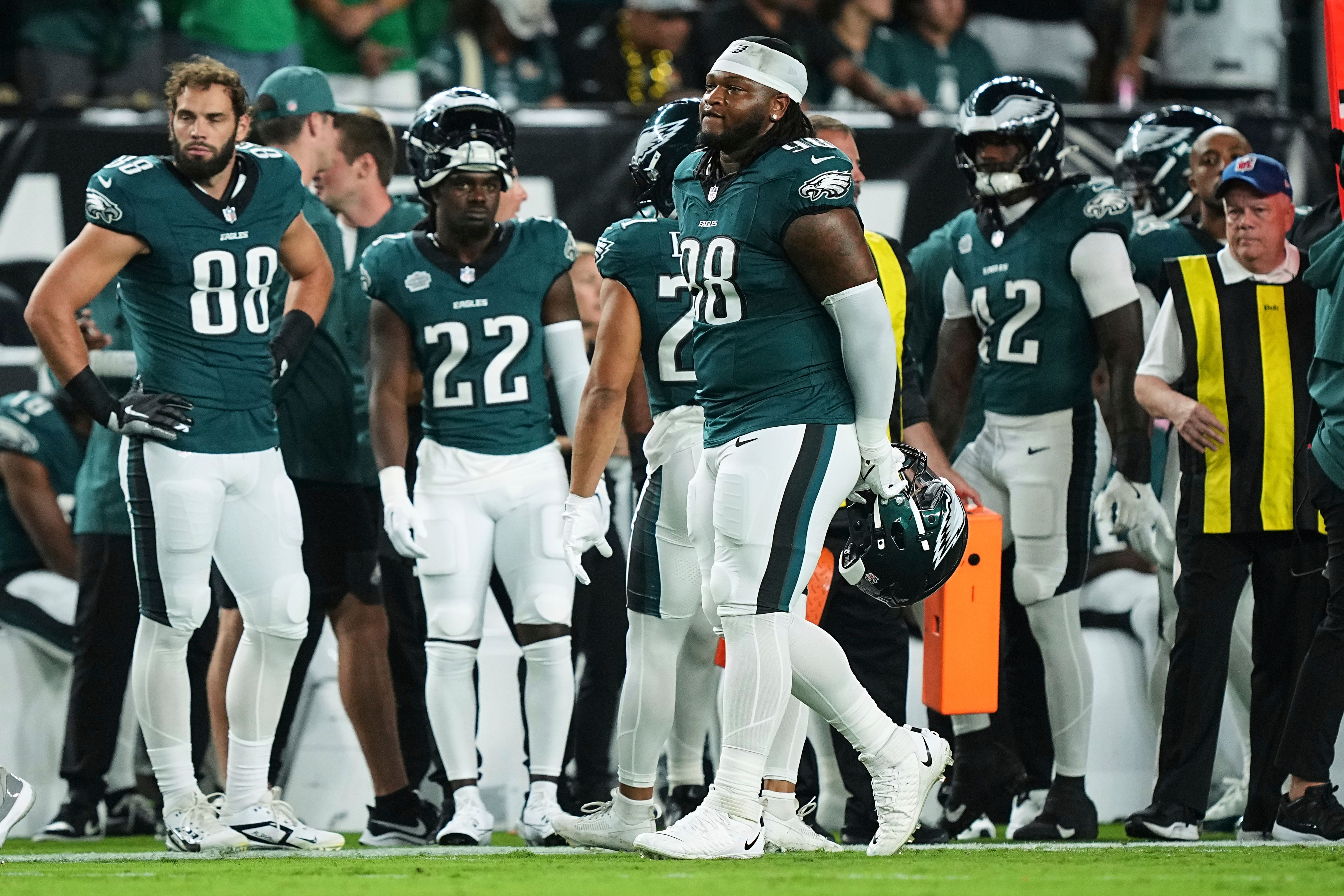 Philadelphia Eagles defensive tackle Jalen Carter (98) walks off the field after being ejected for unsportsmanlike conduct (Matt Rourke/AP)