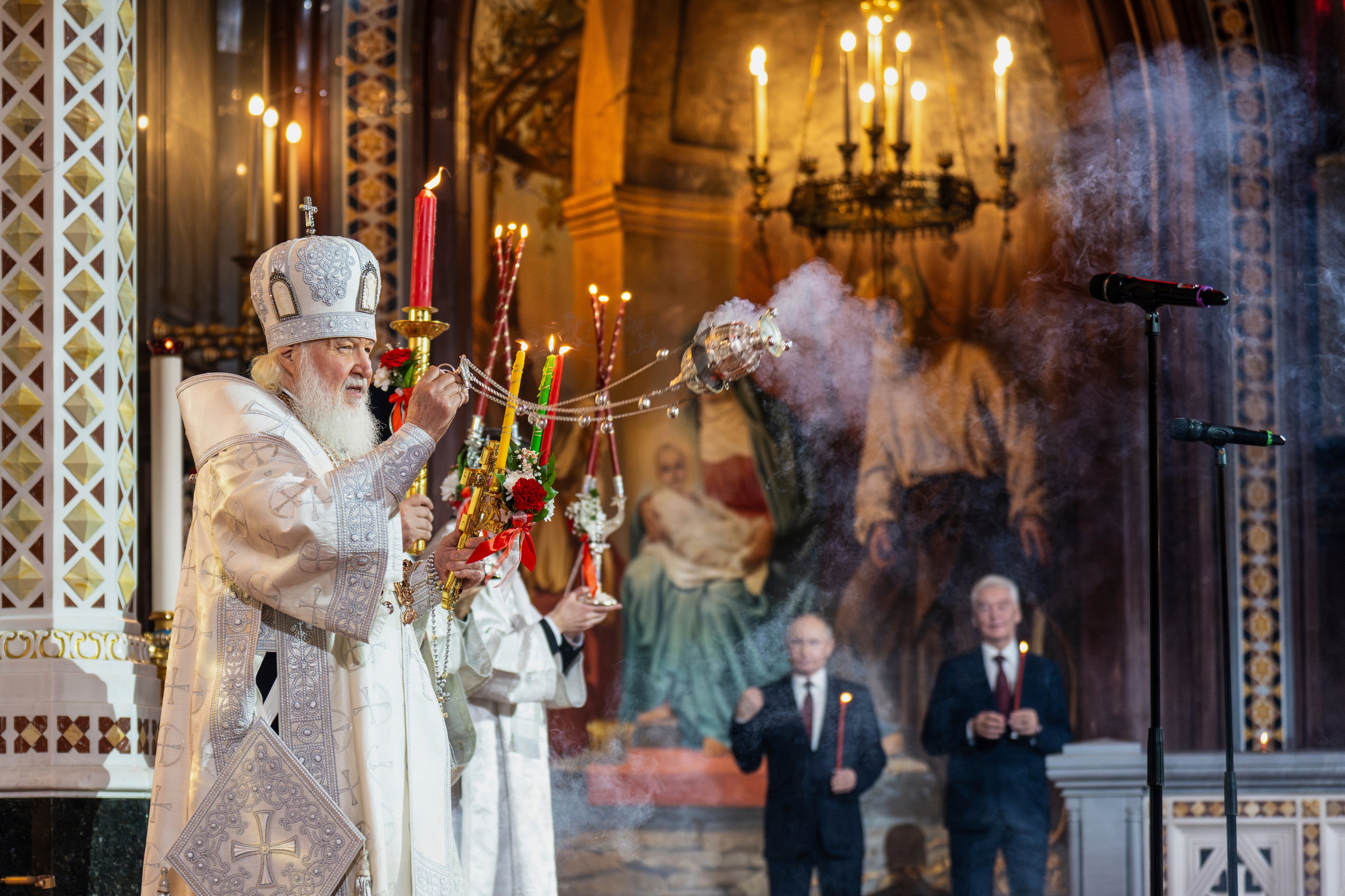 Russian Orthodox Church Patriarch Kirill, left, leads the Orthodox Easter service as Russian President Vladimir Putin, left, and Moscow Mayor Sergei Sobyanin stand near at Christ the Saviour Cathedral in Moscow, Russia, April 20, 2025