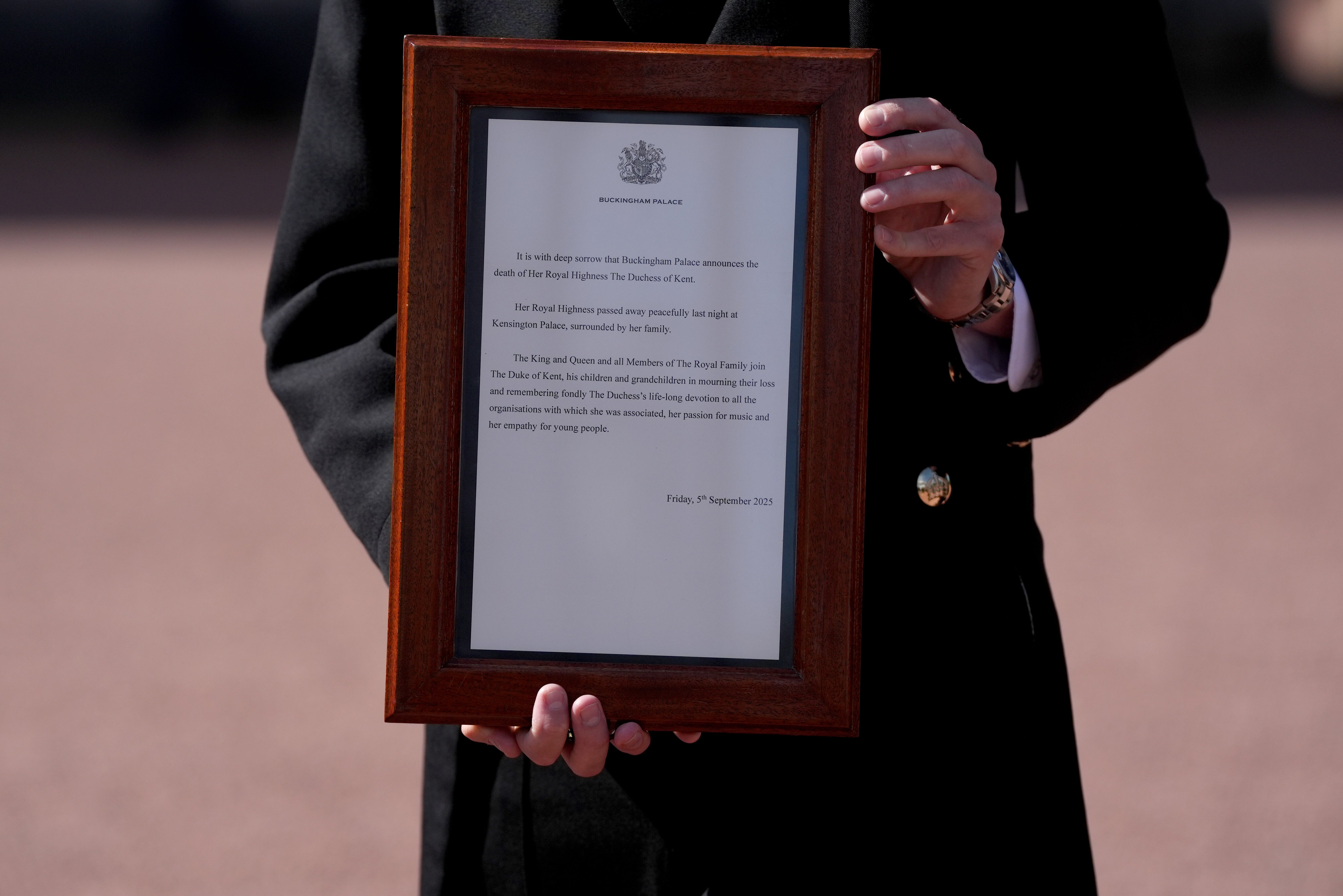 A notice on the gates of Buckingham Palace in London announcing the death of the Duchess of Kent