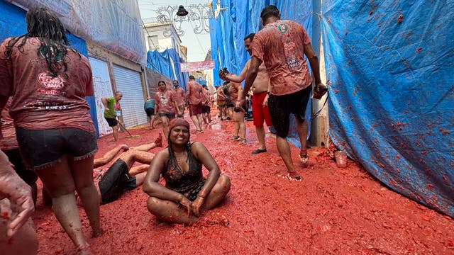 <p>Writer Noopur Jambhekar at Spain's La Tomatina festival </p>