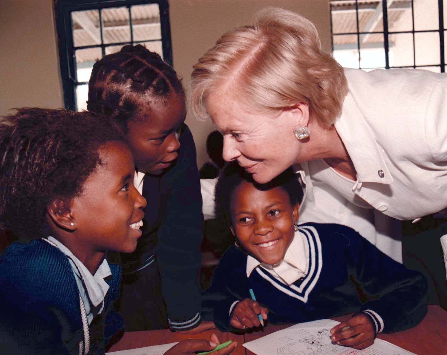 The Duchess of Kent meets pupils at Witkoppen School, near Pretoria in South Africa, in 1997