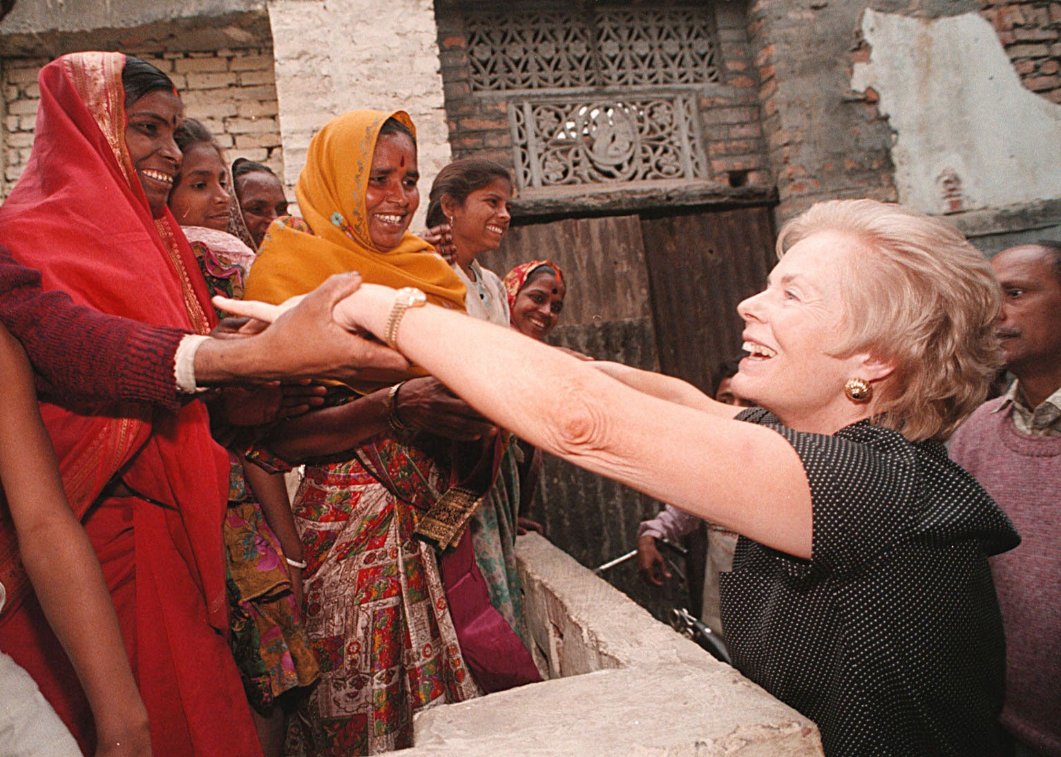 The Duchess of Kent meets women in Varanasi, India, during a visit to mark 50 years of Unicef in 1996