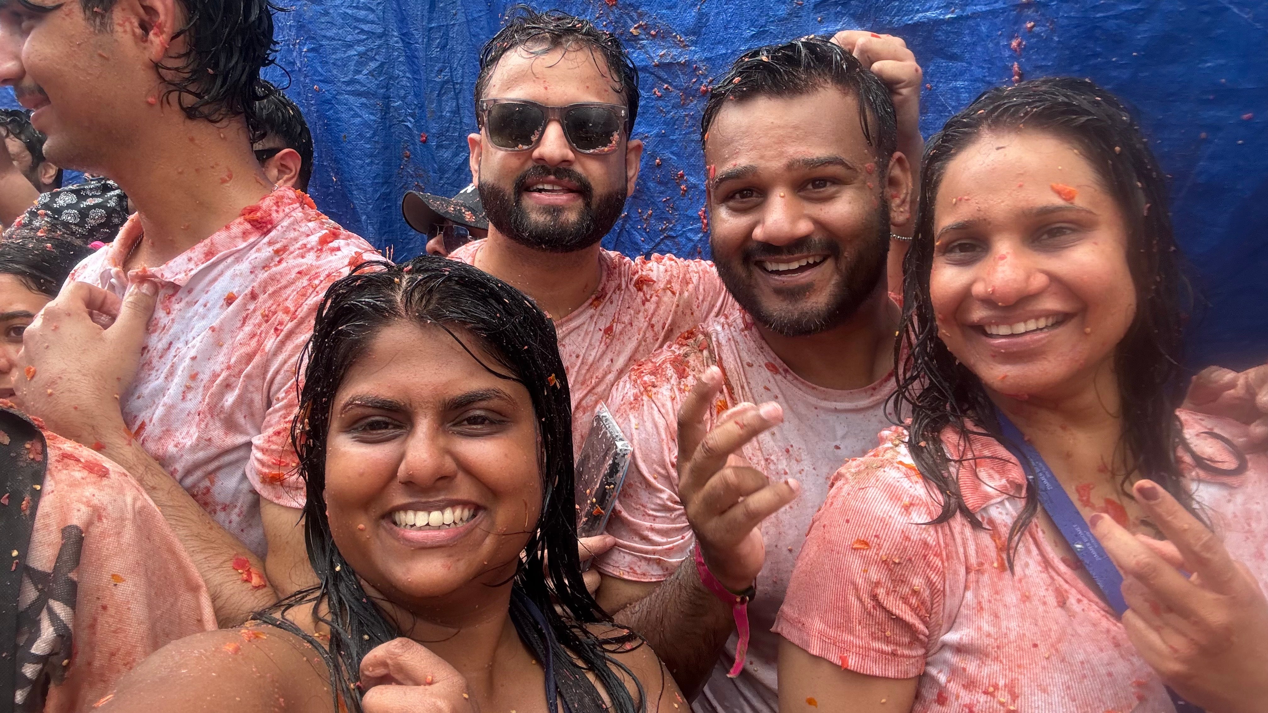 Writer Noopur Jambhekar and her new friends at La Tomatina festival in Bunol, Spain
