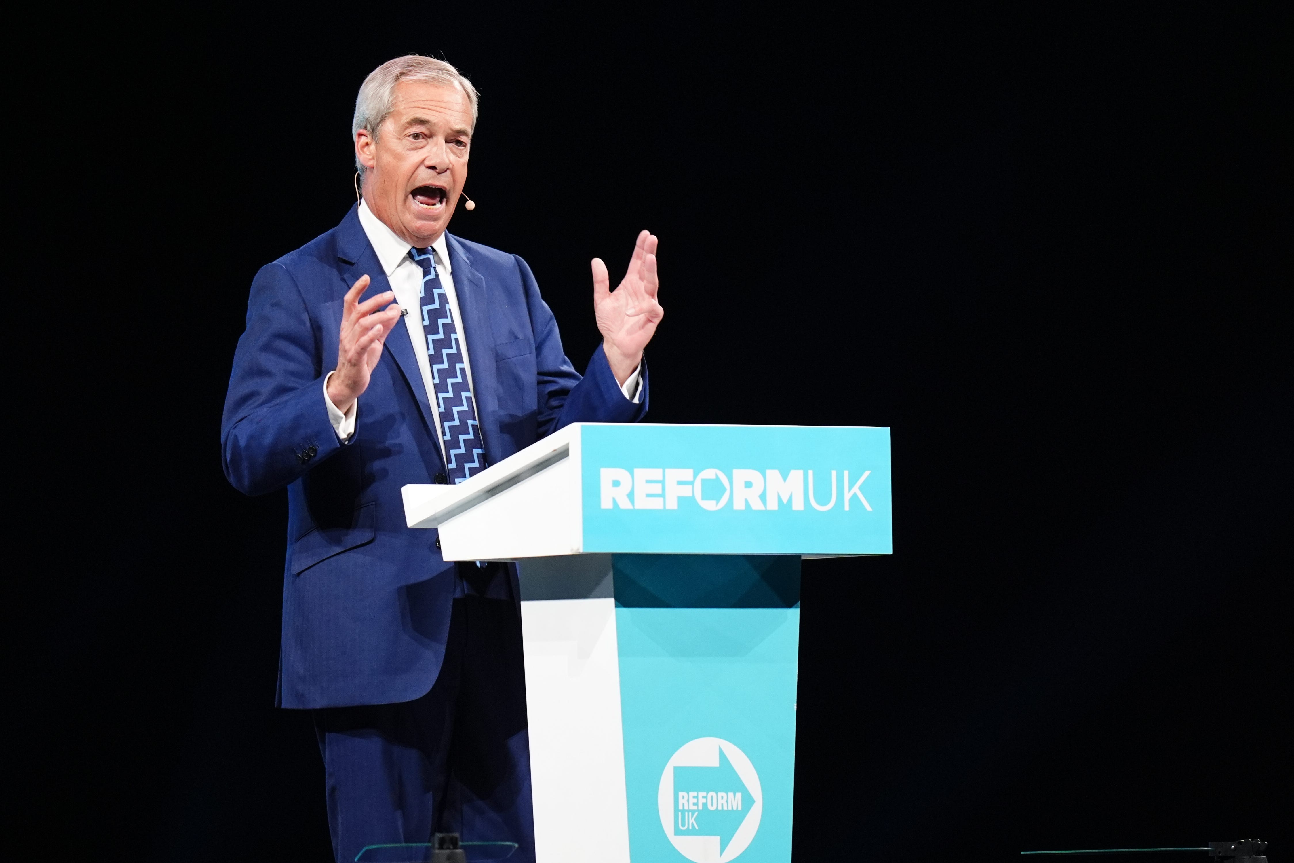 Reform UK leader Nigel Farage speaks during the party’s annual conference at the National Exhibition Centre in Birmingham (Jacob King/PA)