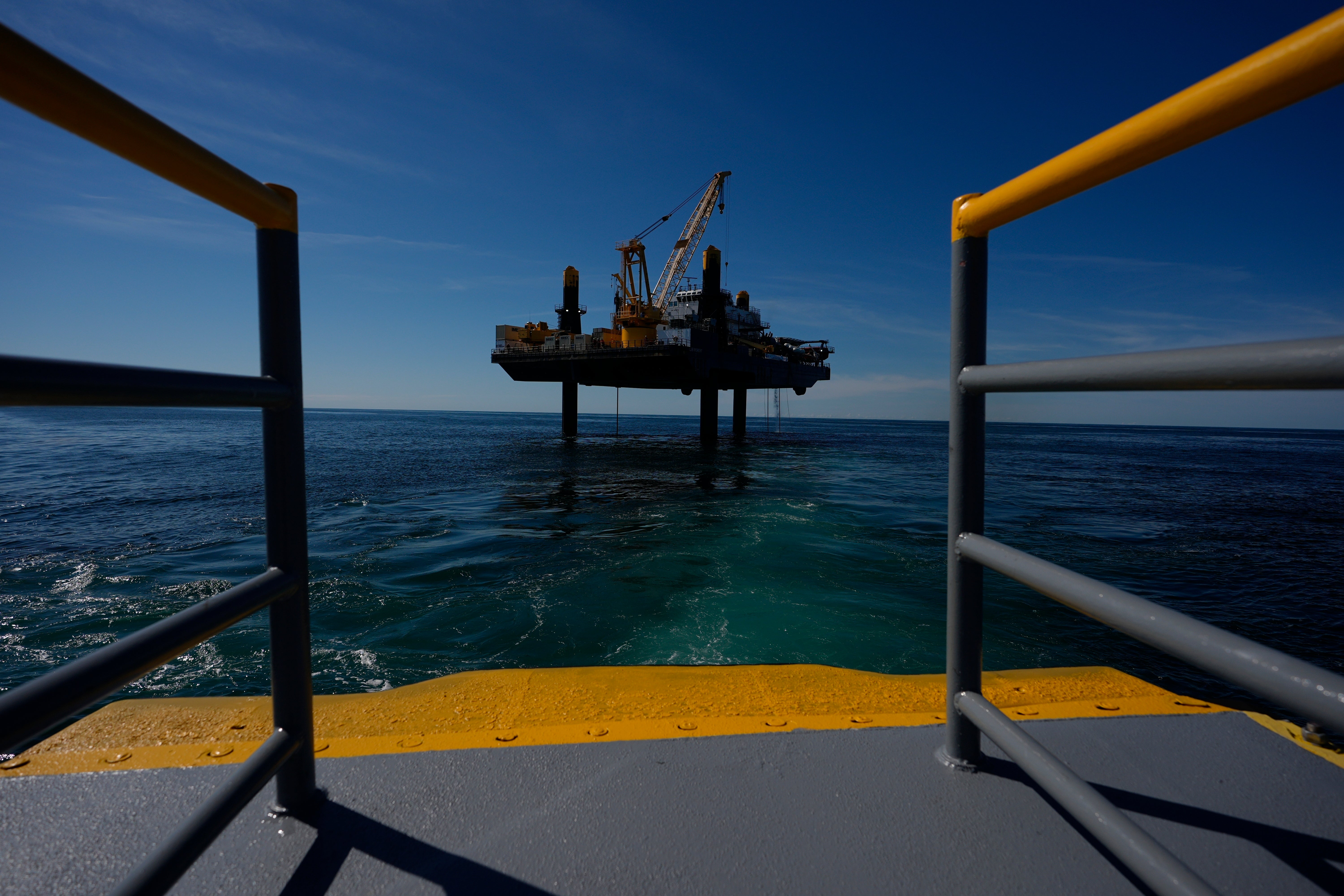 The bow of the Gaspee, a crew transport vessel, is seen as it approaches the Liftboat Robert platform and Expedition 501 in the North Atlantic, Saturday, July 19, 2025. (AP Photo/Carolyn Kaster)