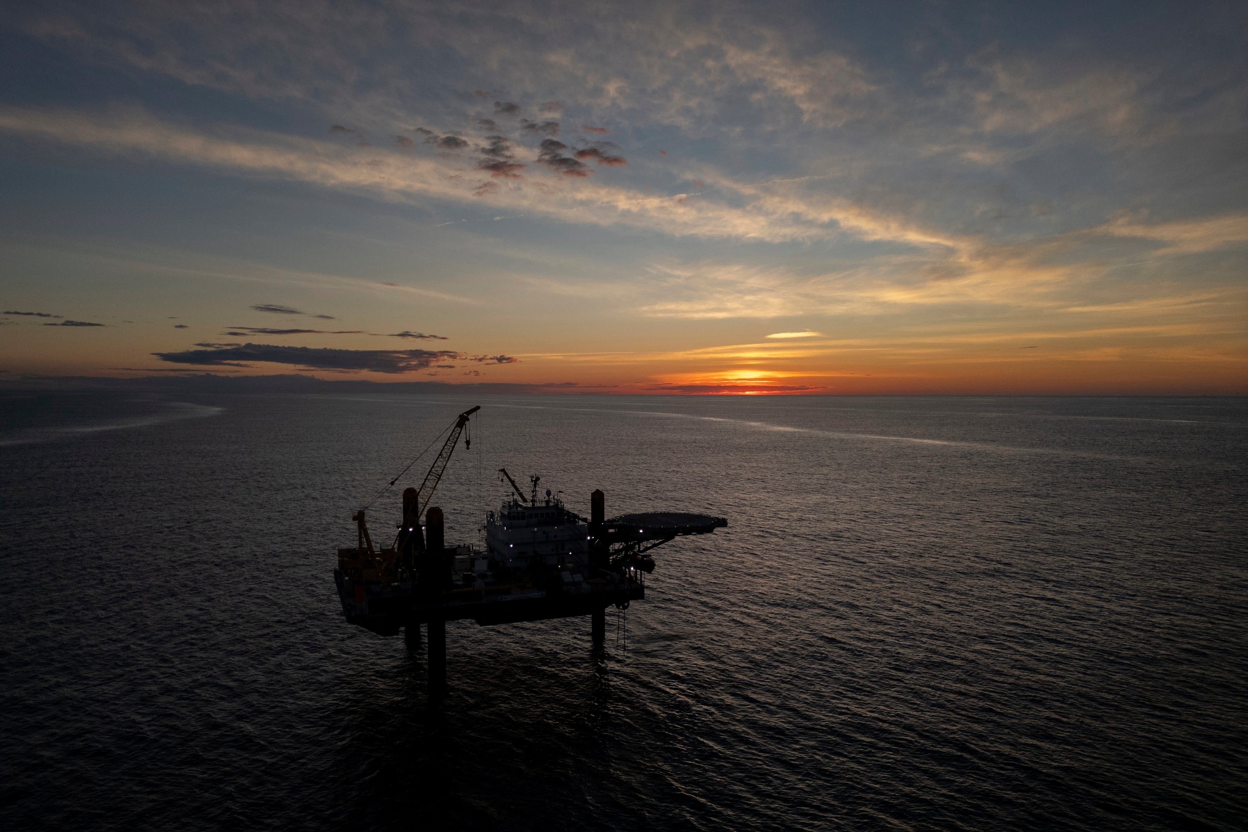 Climate The sun sets behind the Liftboat Robert platform, home of Expedition 501, in the North Atlantic, Saturday, July 19, 2025. (AP Photo/Carolyn Kaster) Freshwater
