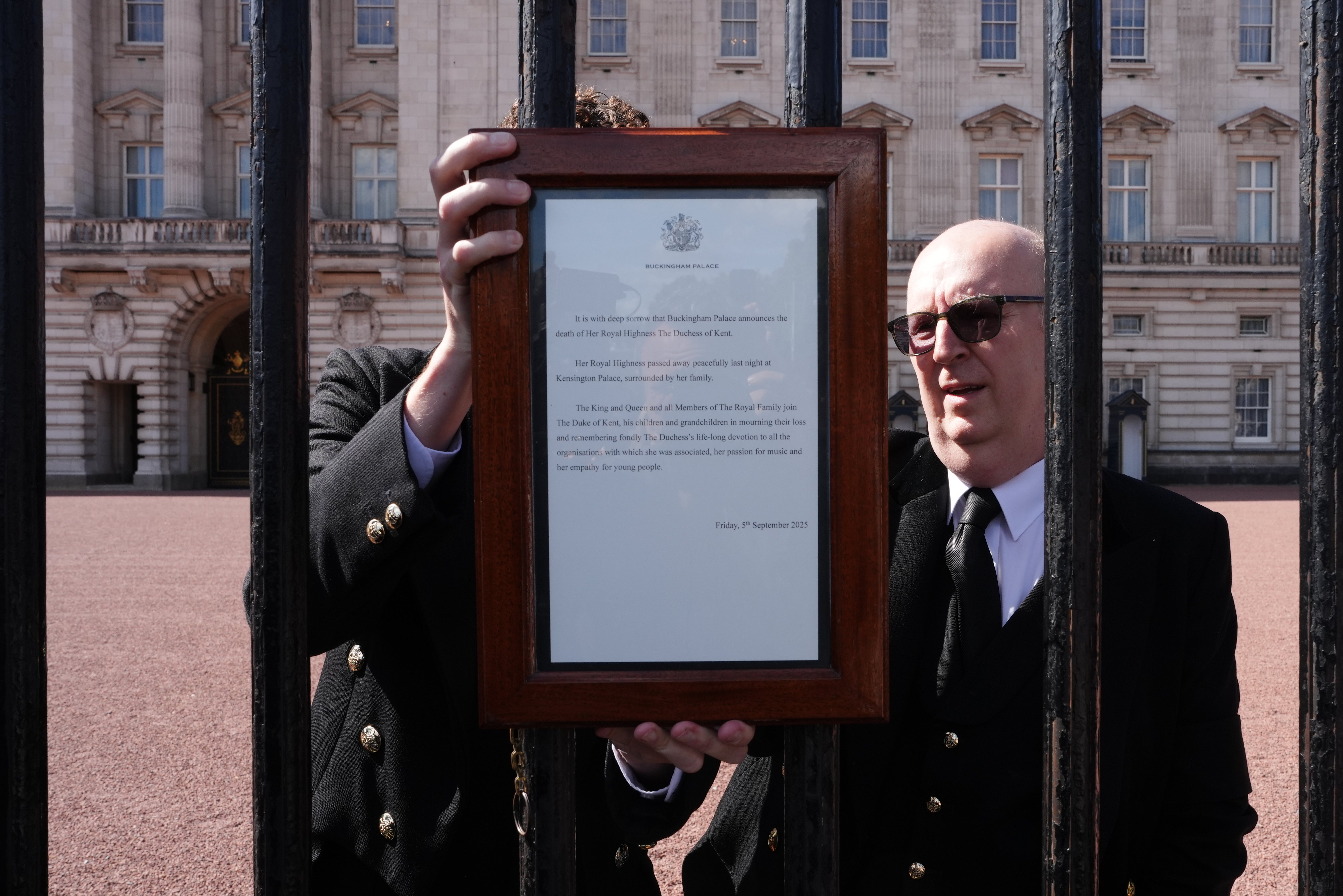 A notice is placed on the gates of Buckingham Palace in London