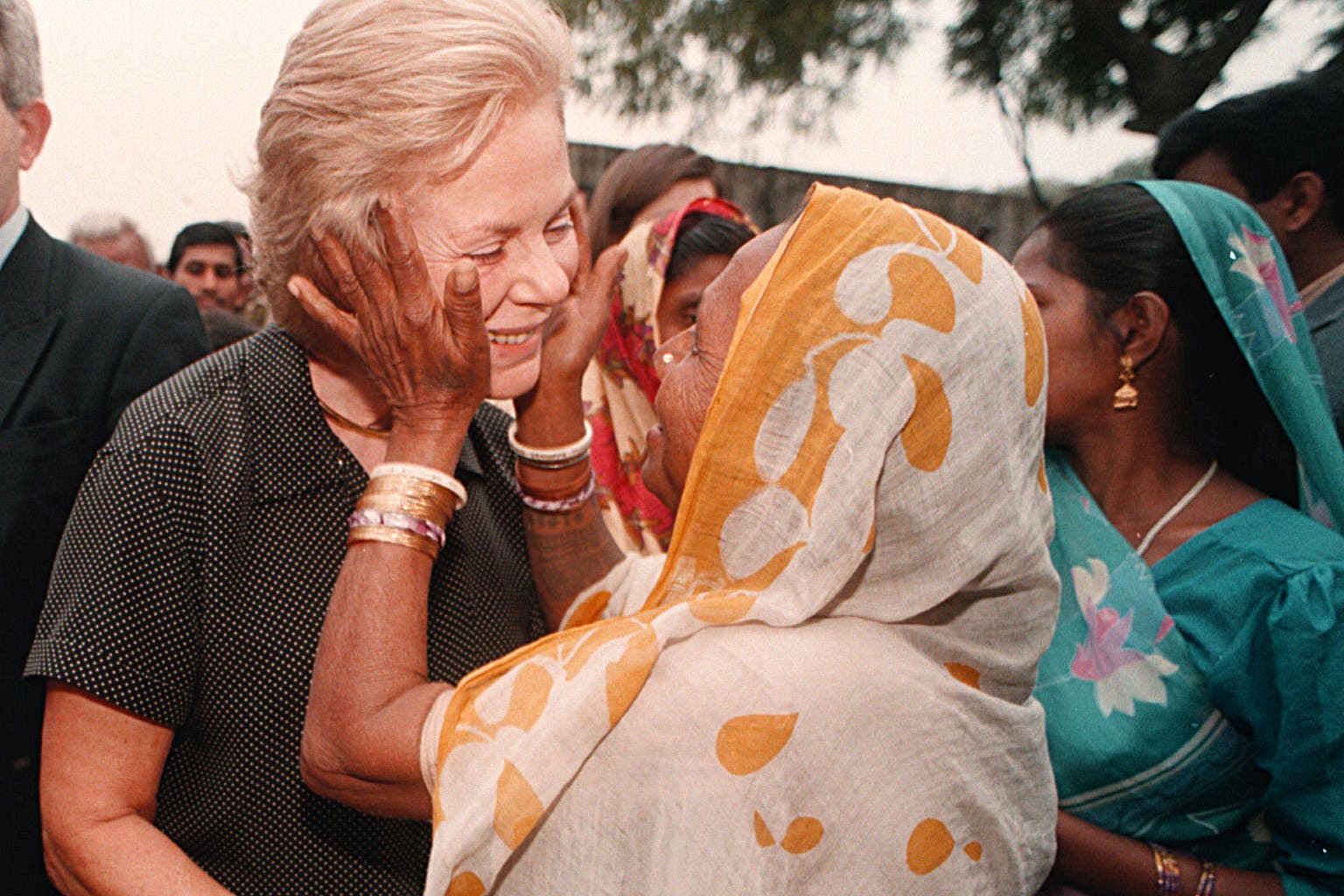 The Duchess of Kent being greeted in a slum area of Varanasi in northern India during her visit to mark the 50th anniversary of Unicef in 1996 (Stefan Rousseau/PA)