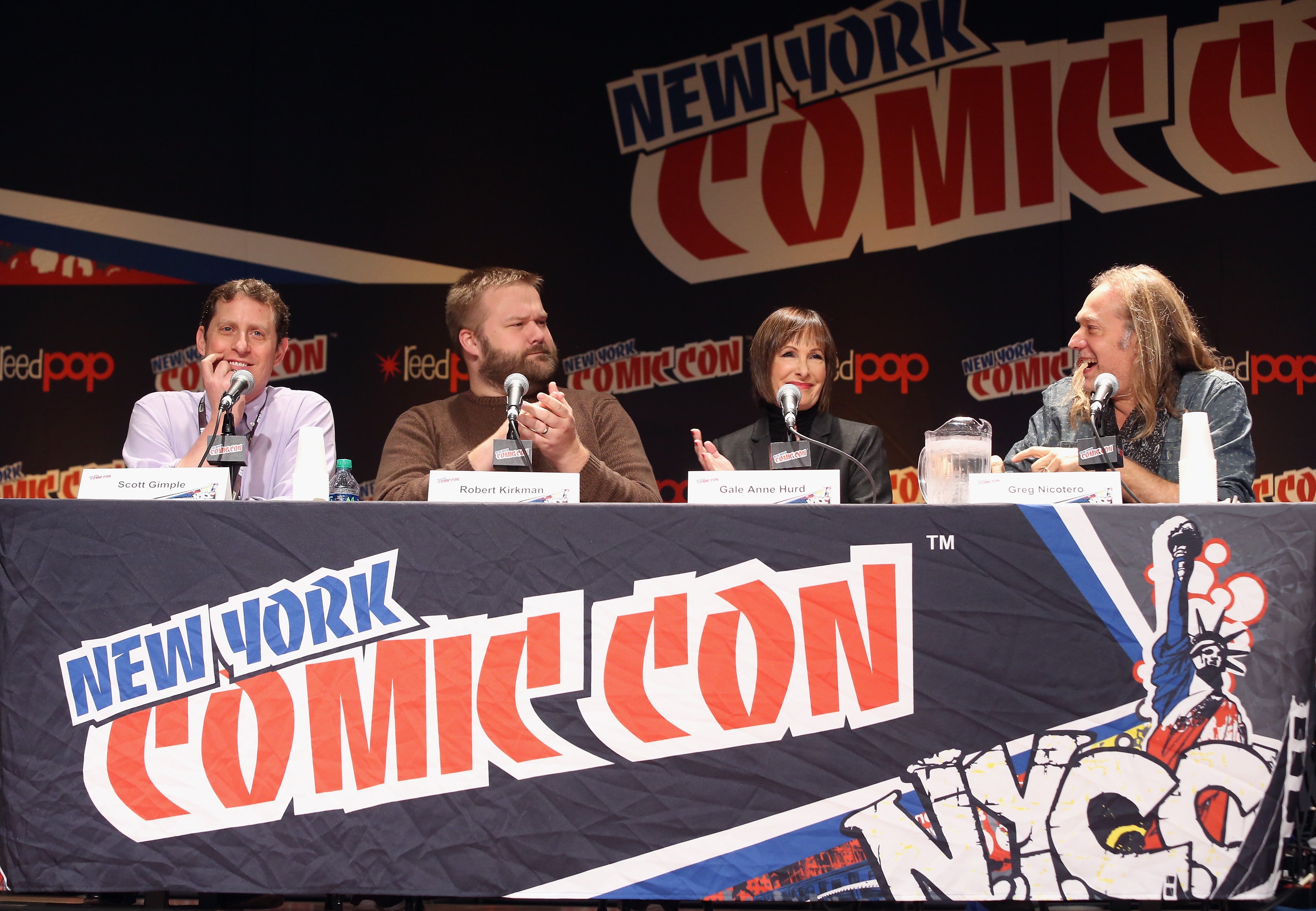 Kirkman (second from left) is named as a defendant in Thomas Richards's lawsuit over an eponymous character in the smash series