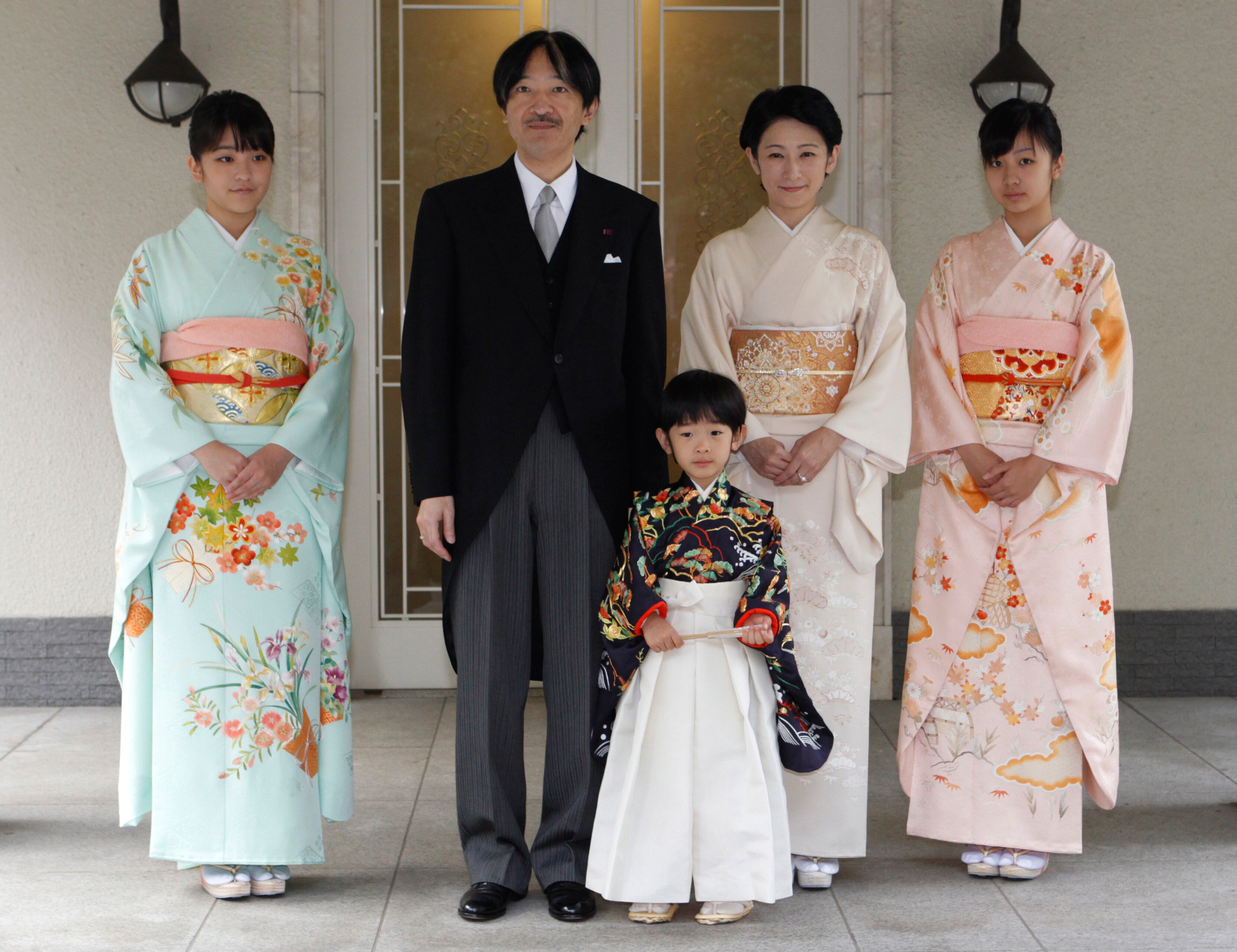 Japan's Prince Hisahito, wearing traditional ceremonial attire, is accompanied by his parents, Prince Akishino, Princess Kiko, his sisters Princess Mako, left, and Princess Kako, right, after attending a "Chakko-no-gi" ceremony to celebrate his growth and the passage from infancy to childhood in 2011
