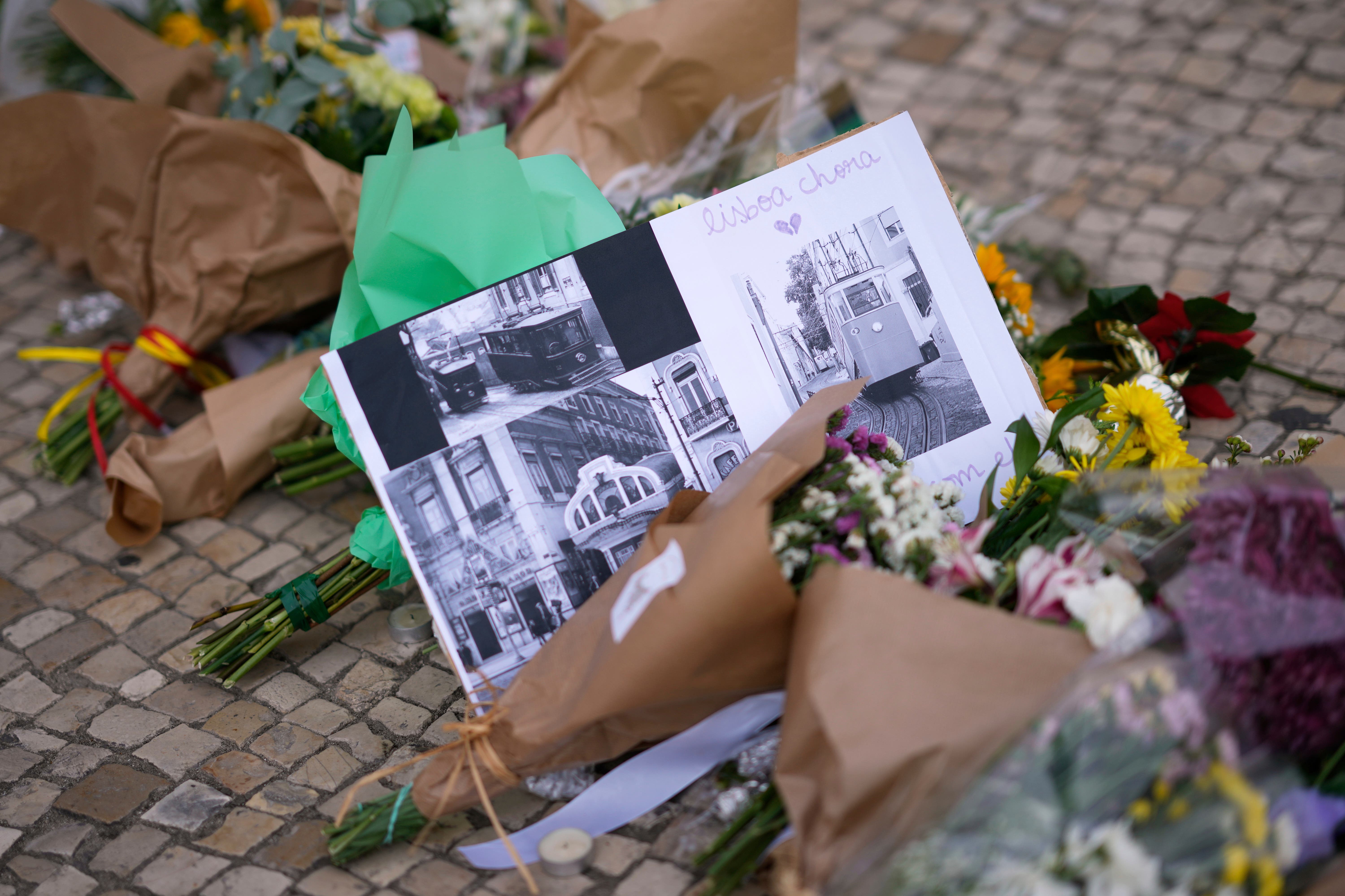 Tributes have been paid to the British couple who died in the Lisbon funicular crash (Armando Franca/AP/PA)