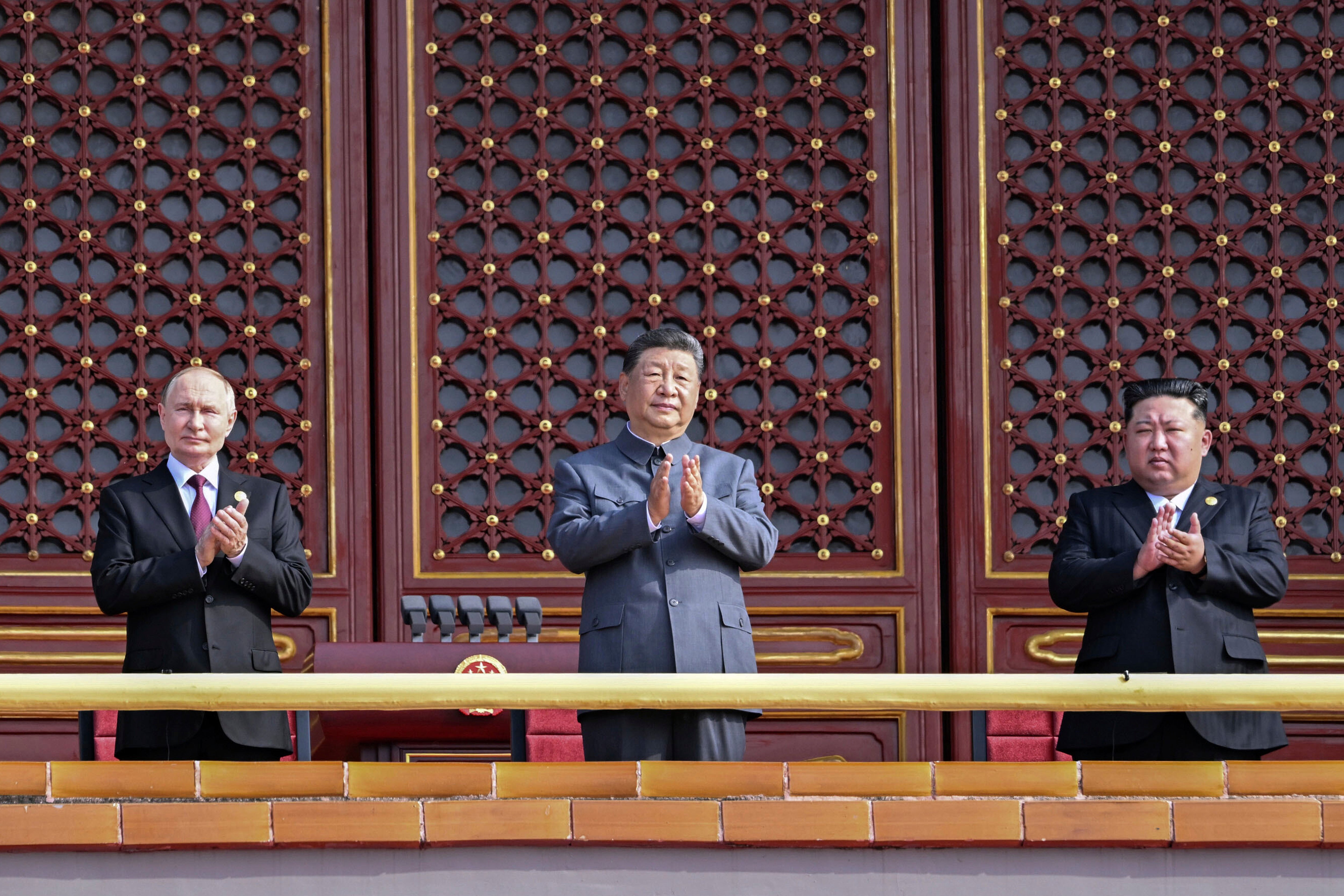 From right, Kim, Chinese president Xi Jinping and Russian president Vladimir Putin attend a military parade marking the 80th anniversary of the end of World War II at Tiananmen Square in Beijing on 3 September