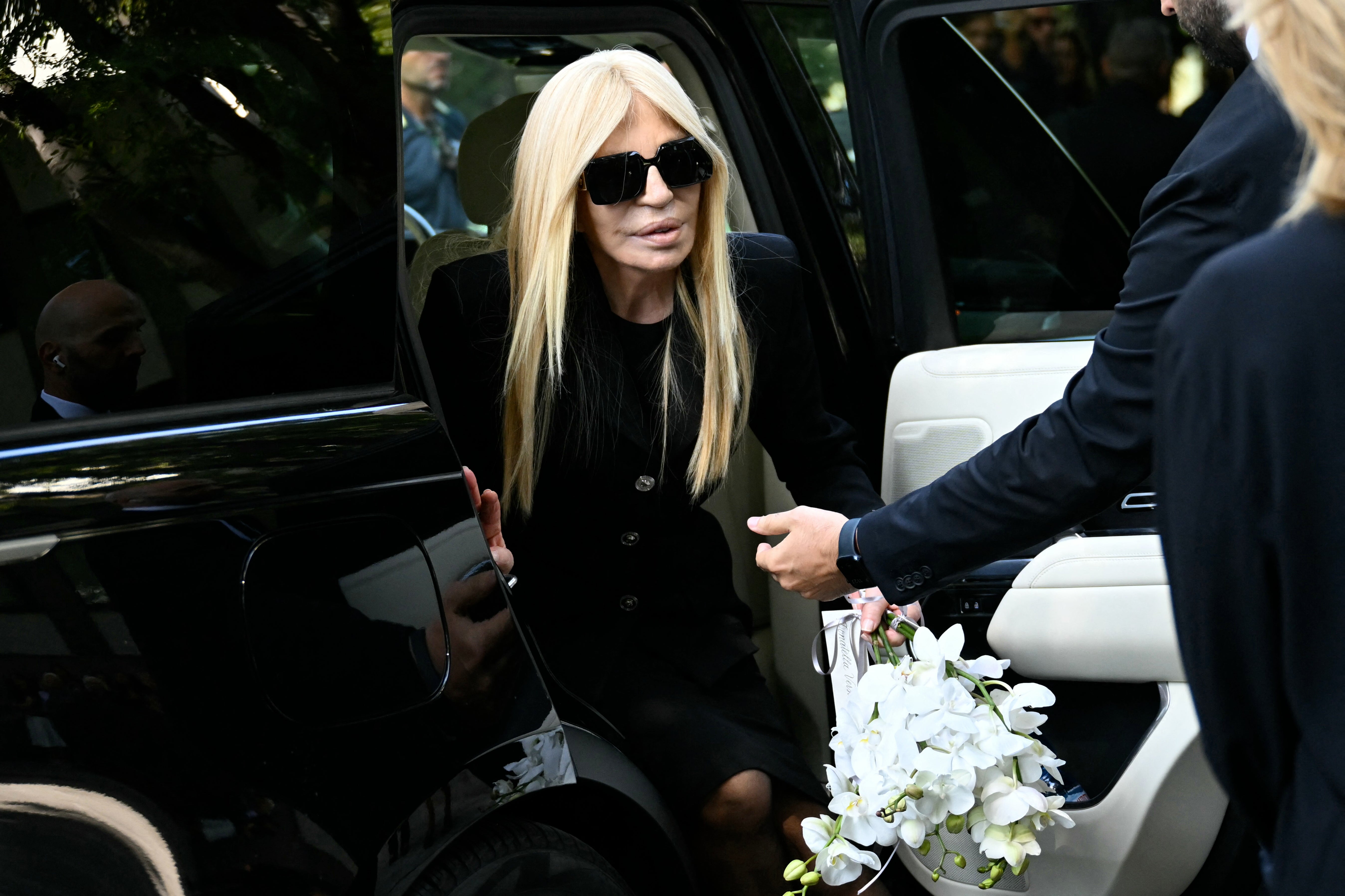 Italian fashion designer Donatella Versace arrives at the Armani Theatre where late Italian fashion designer Giorgio Armani lies in state, in Milan, Italy