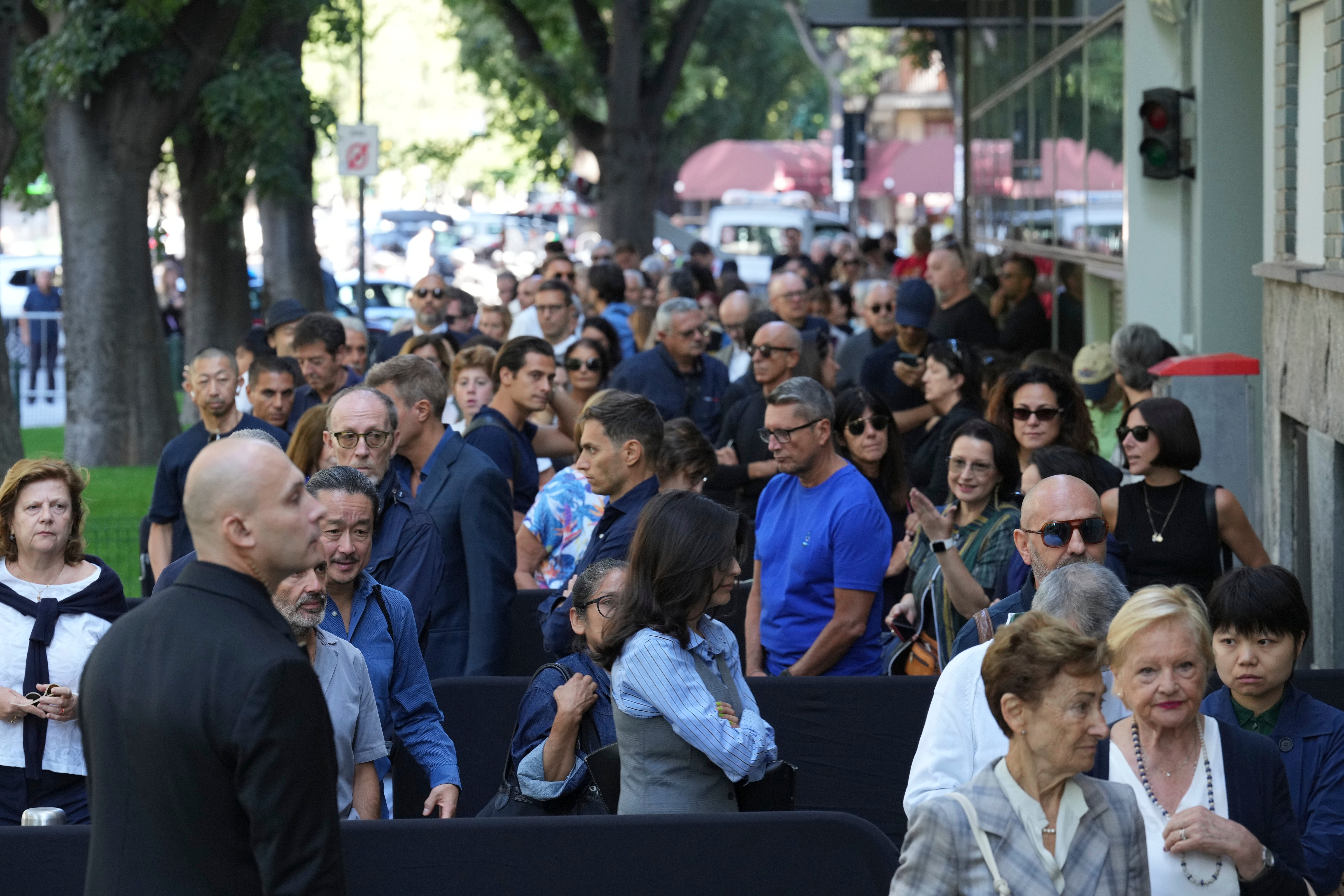 People line up to pay their respects