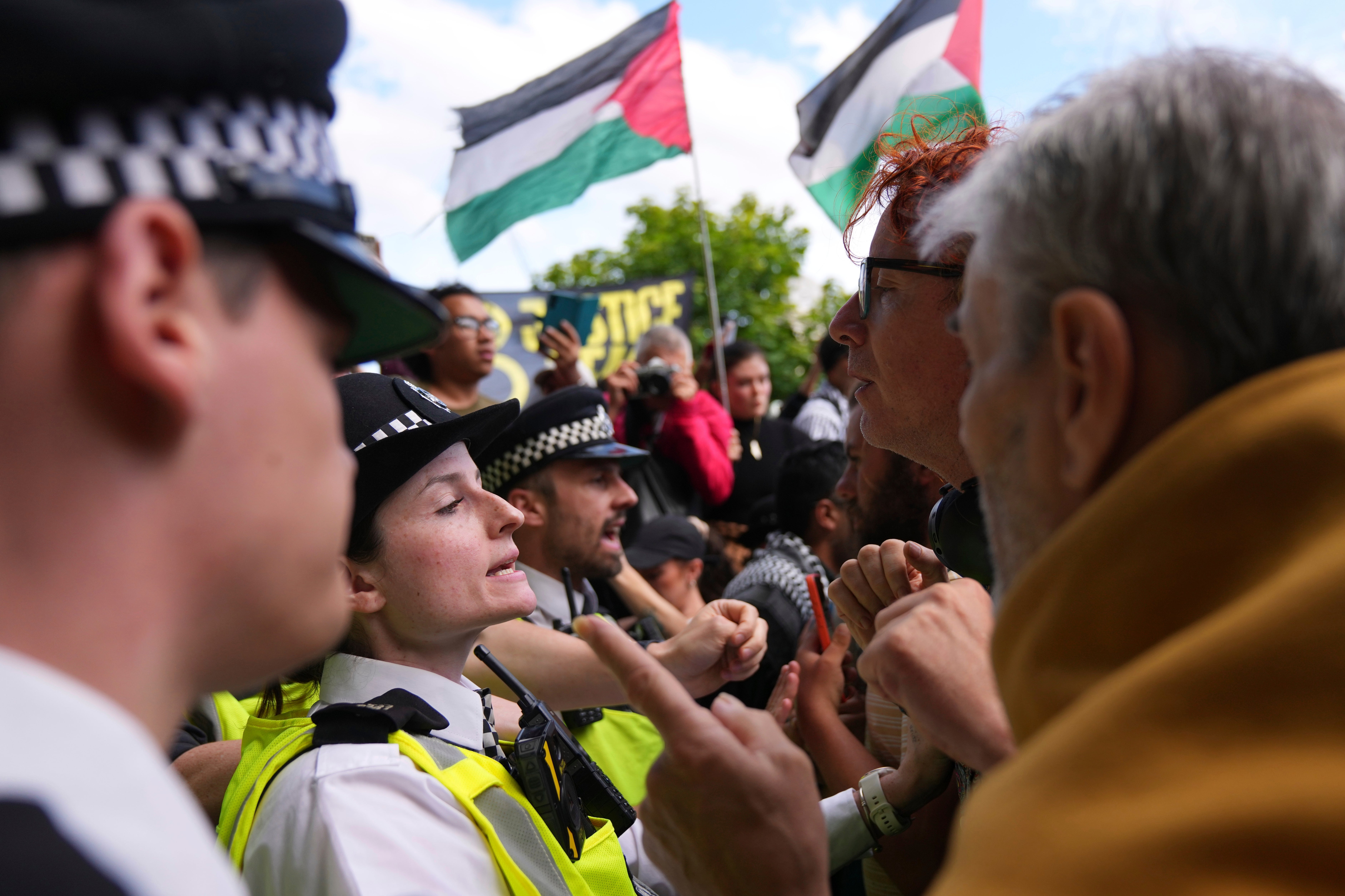 Tensions flare between protesters and police on Saturday