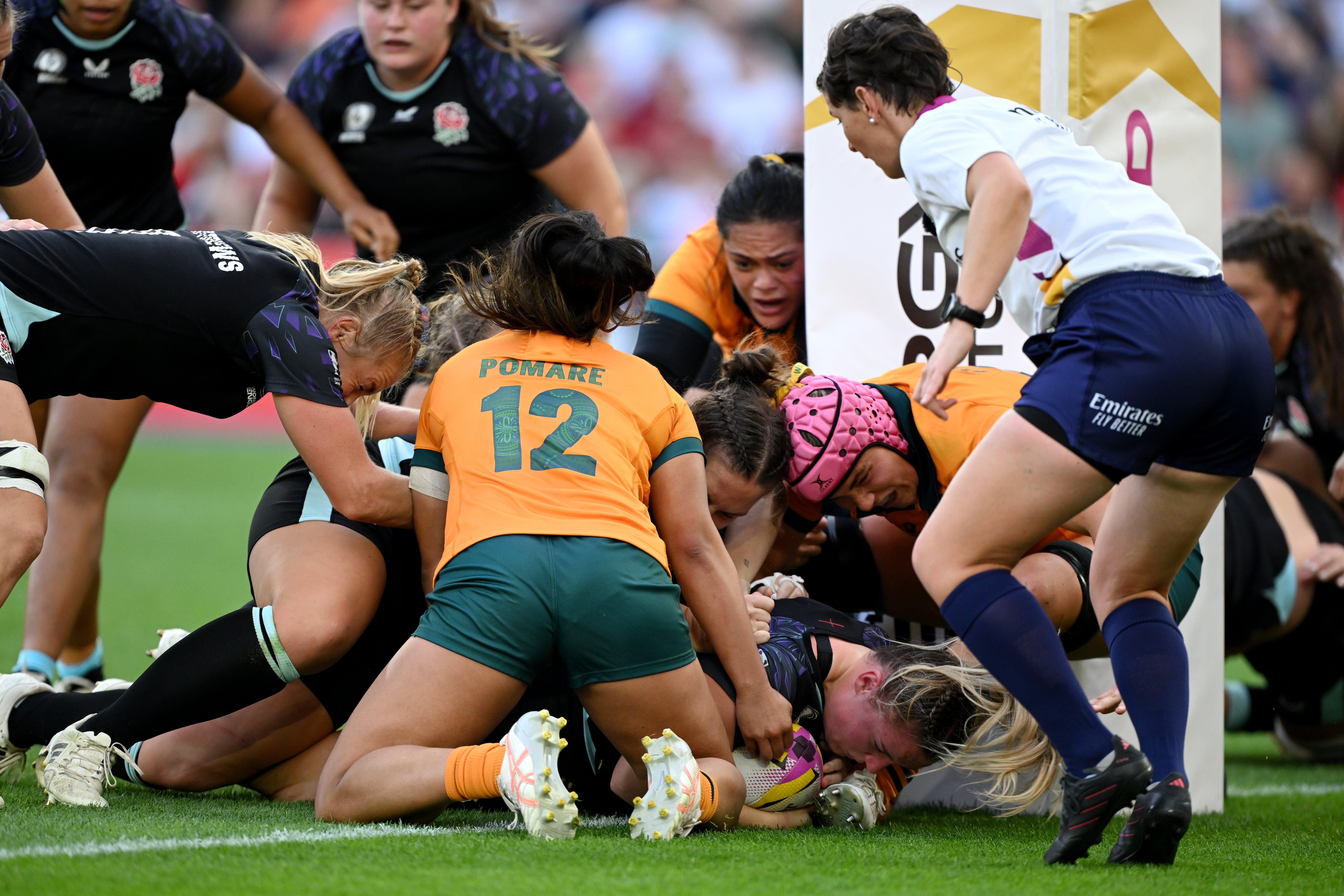 England overcame a battling Australia to progress to top of the pool