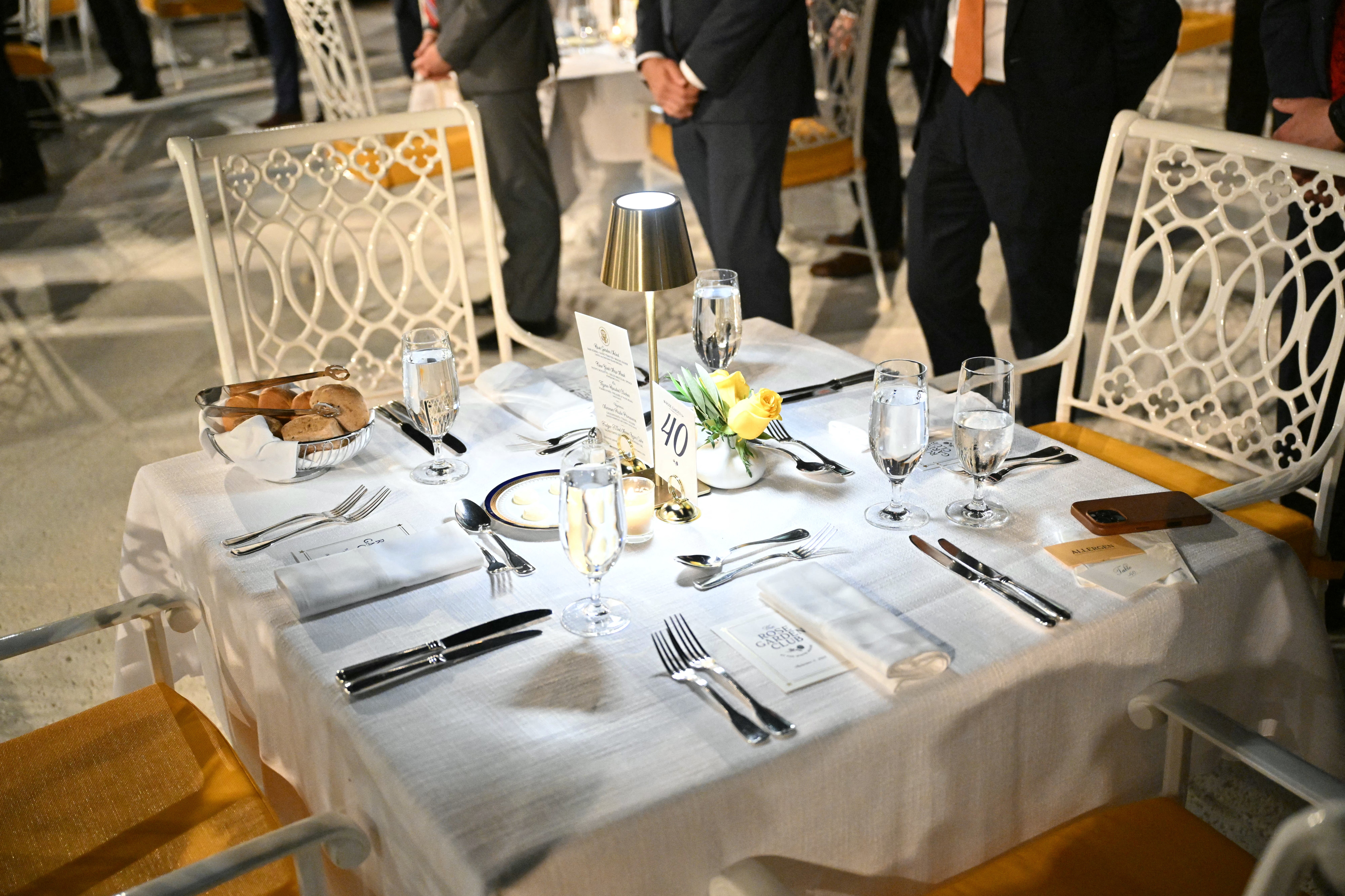 Table settings at the ‘Rose Garden Club’ dinner hosted by the president on Friday evening