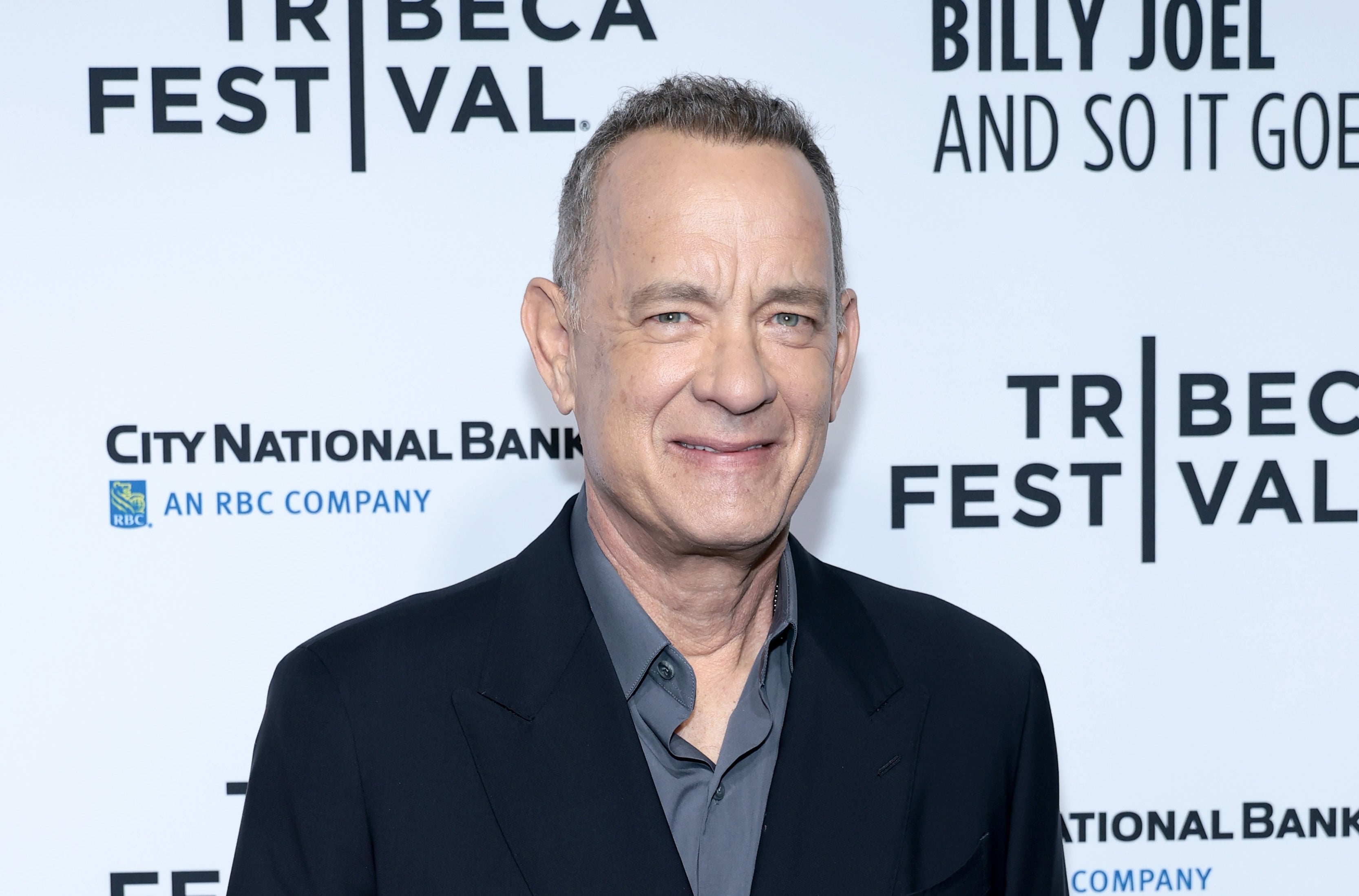 Tom Hanks was gepland om een ​​prijs te ontvangen voor een 'uitstekende burger' en een voorbeeld van de idealen van het college, eer en het land van het college te illustreren