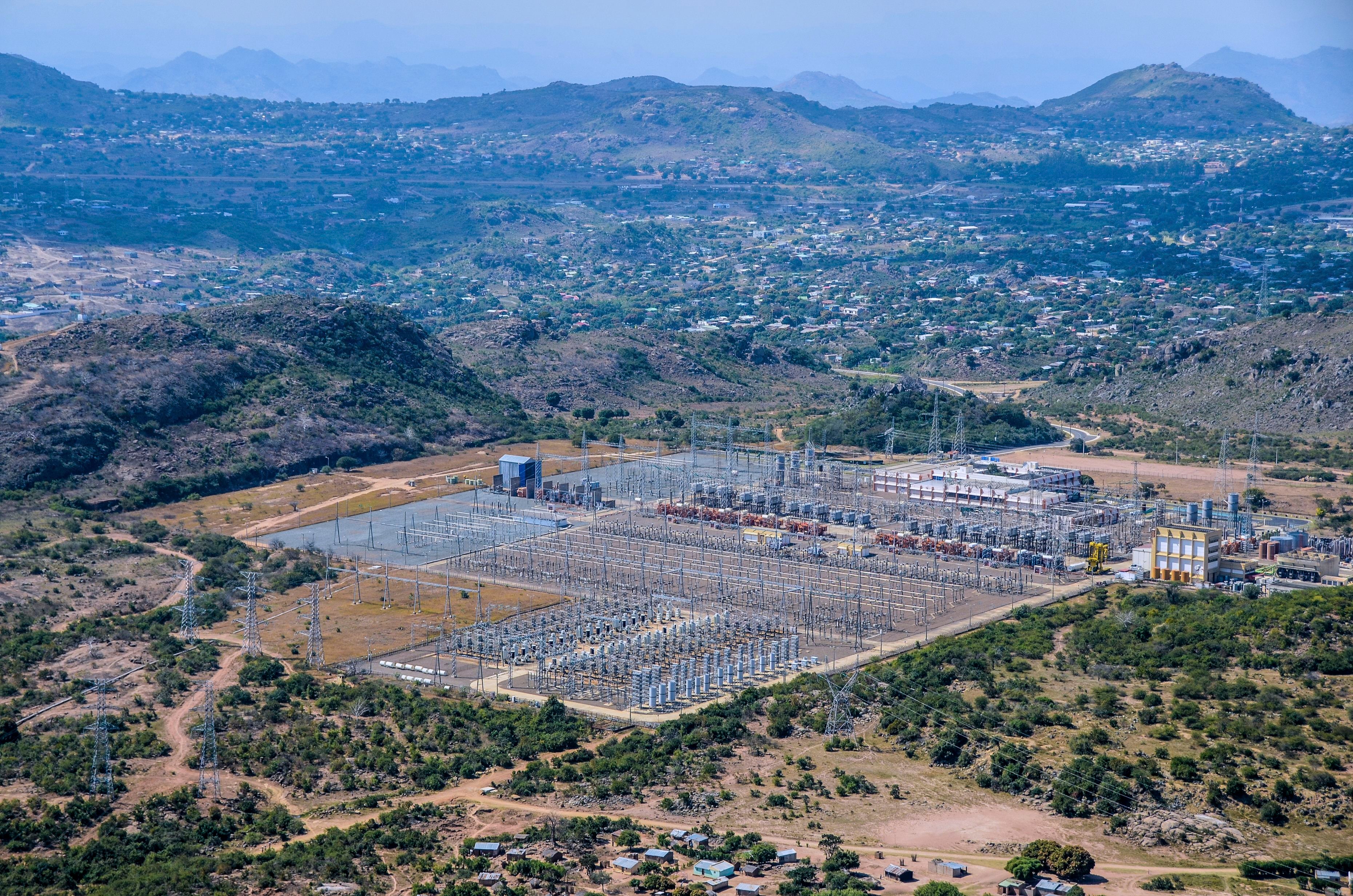 Aerial view of the a substation, in Songo, Mozambique, Saturday, July 19, 2025. (AP Photo/Carlos Uqueio)