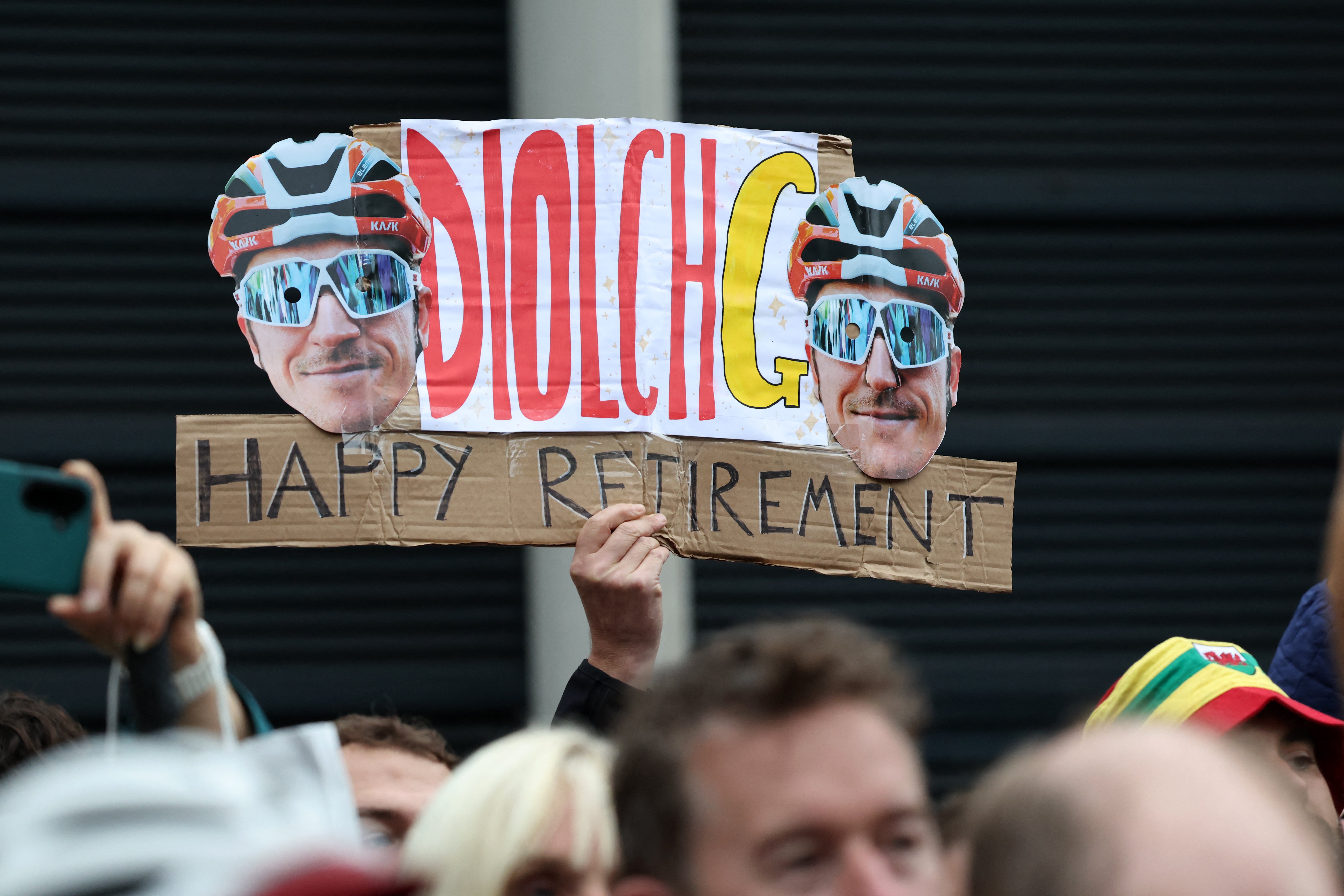 A fan holds up a sign in Cardiff