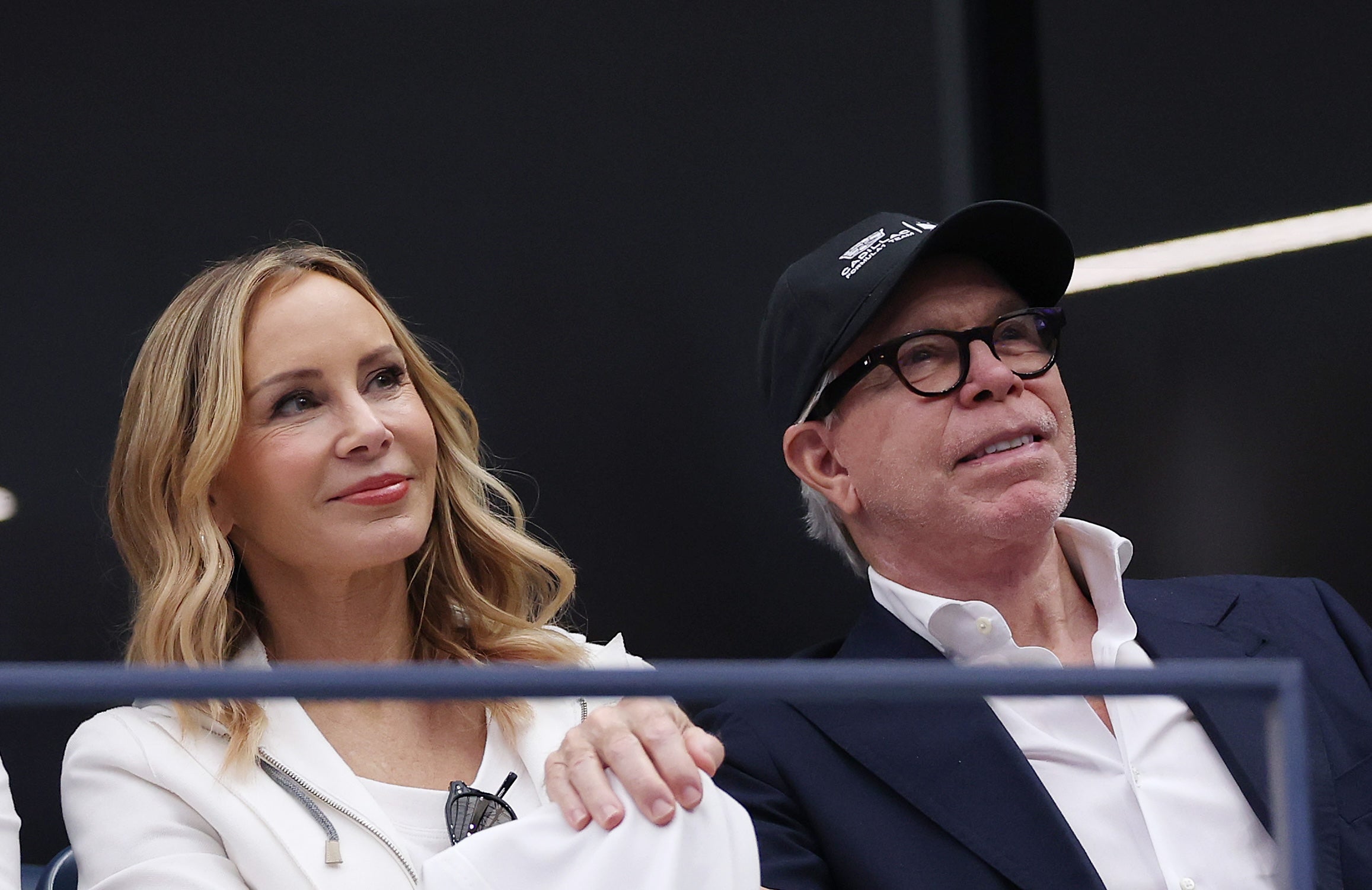 Dee and Tommy Hilfiger in the crowd at the 2025 U.S. Open men's final