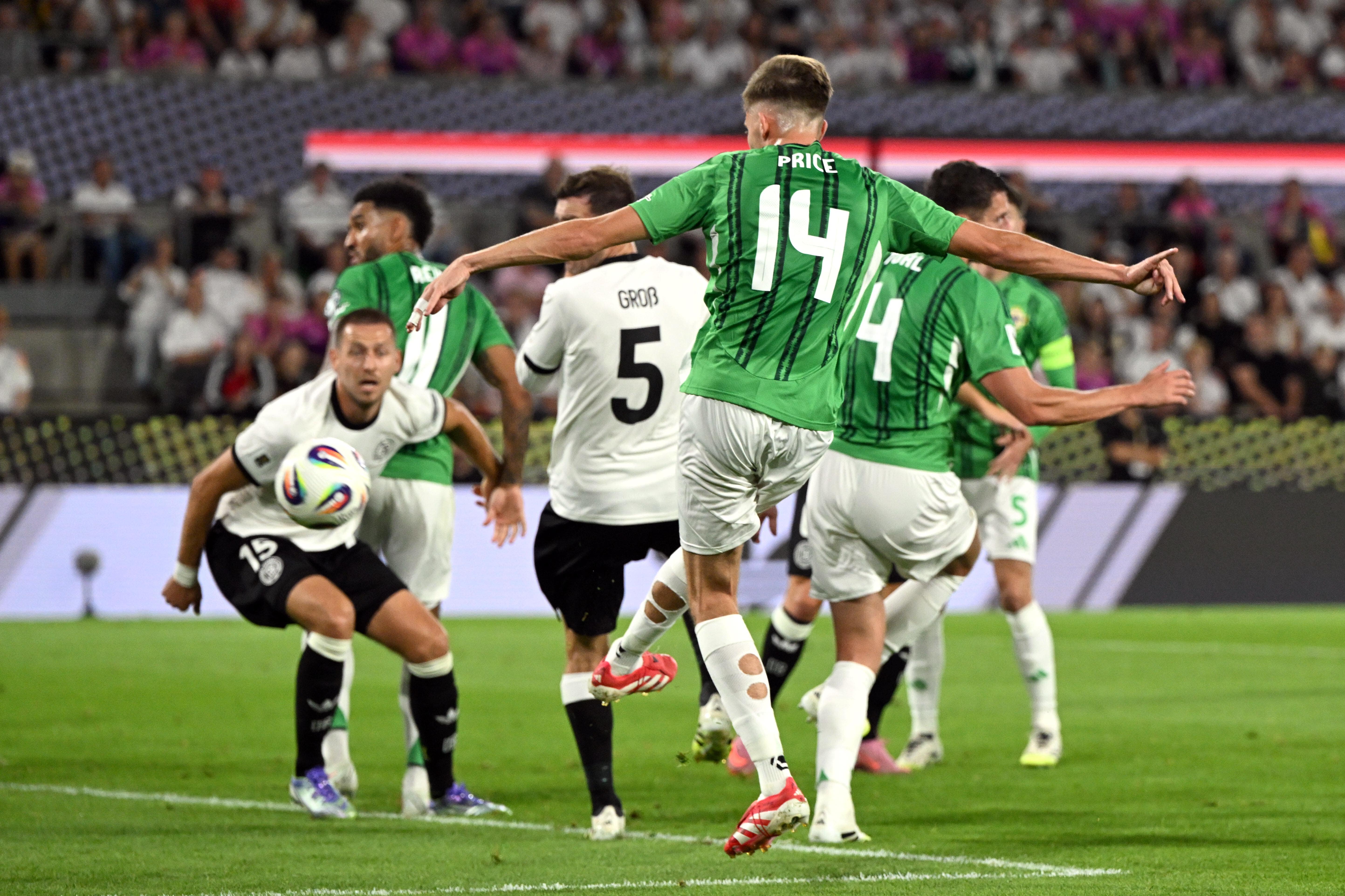 Isaac Price scores Northern Ireland’s equaliser (PA Wire)