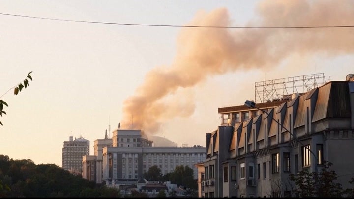 Smoke rising from a government building after a Russian attack on Kyiv on 7 September