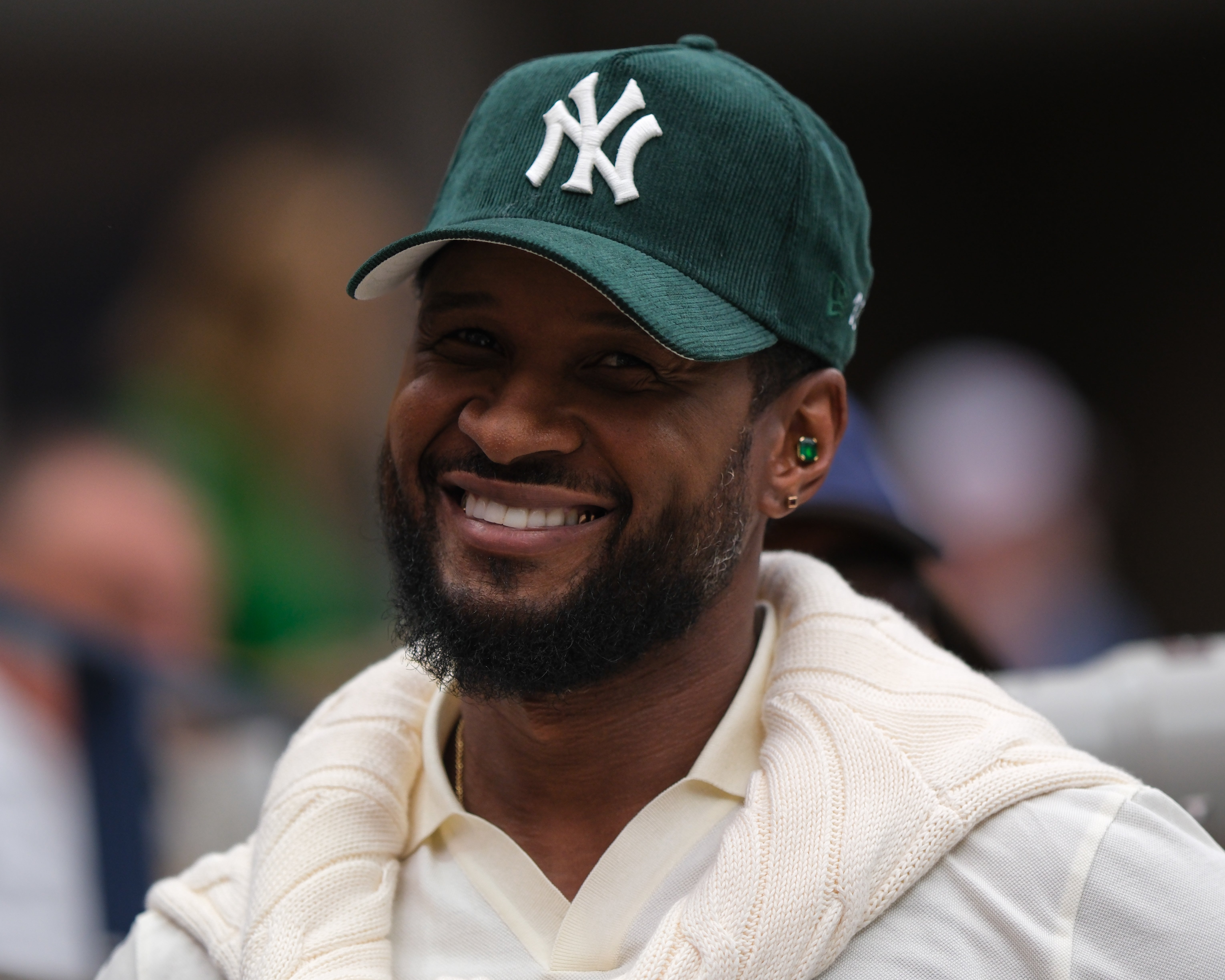 R&B singer Usher in the stands at the 2025 U.S. Open men's final