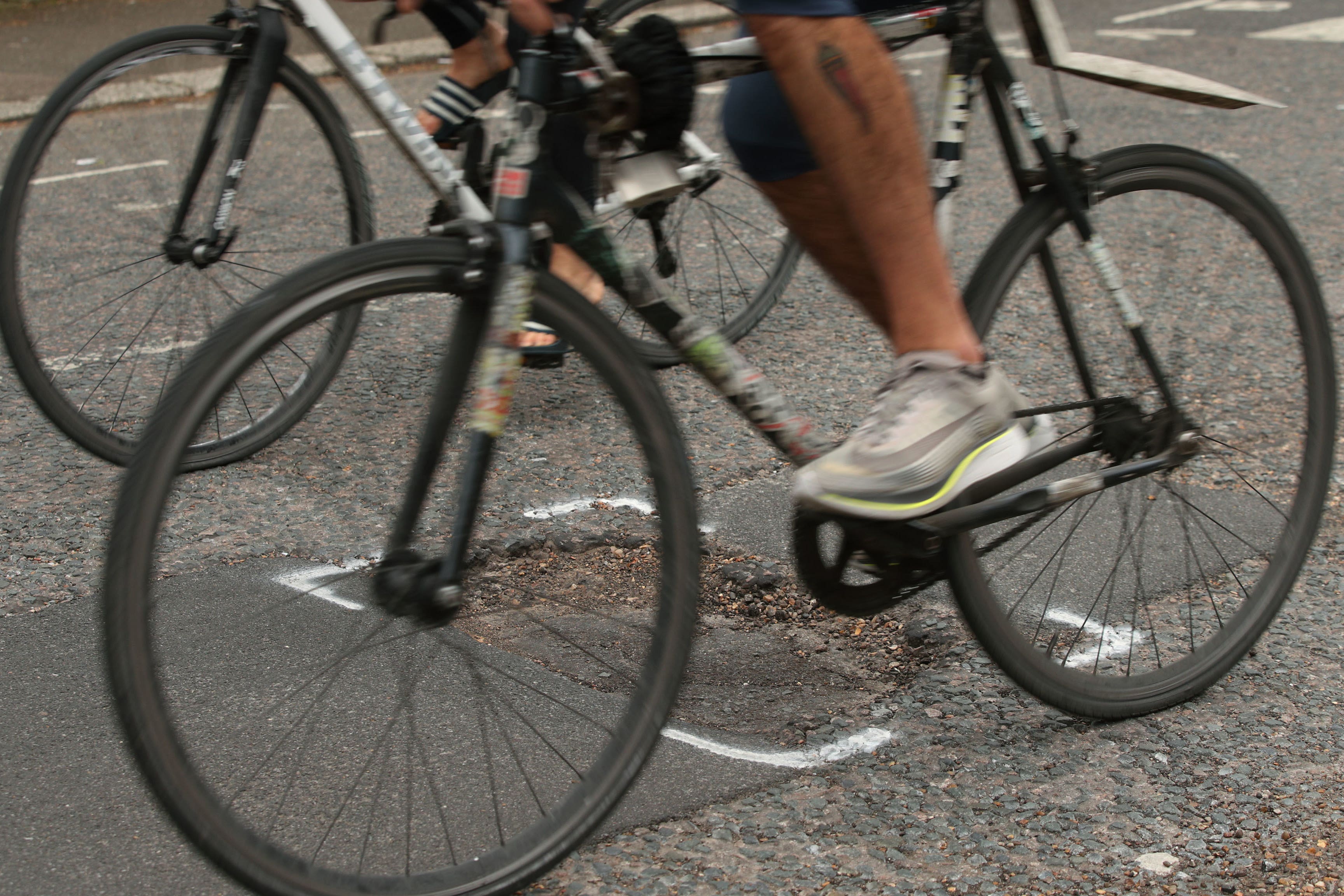 Councils which carry out little or no pothole-prevention maintenance should face mandatory training, it has been claimed (Yui Mok/PA)