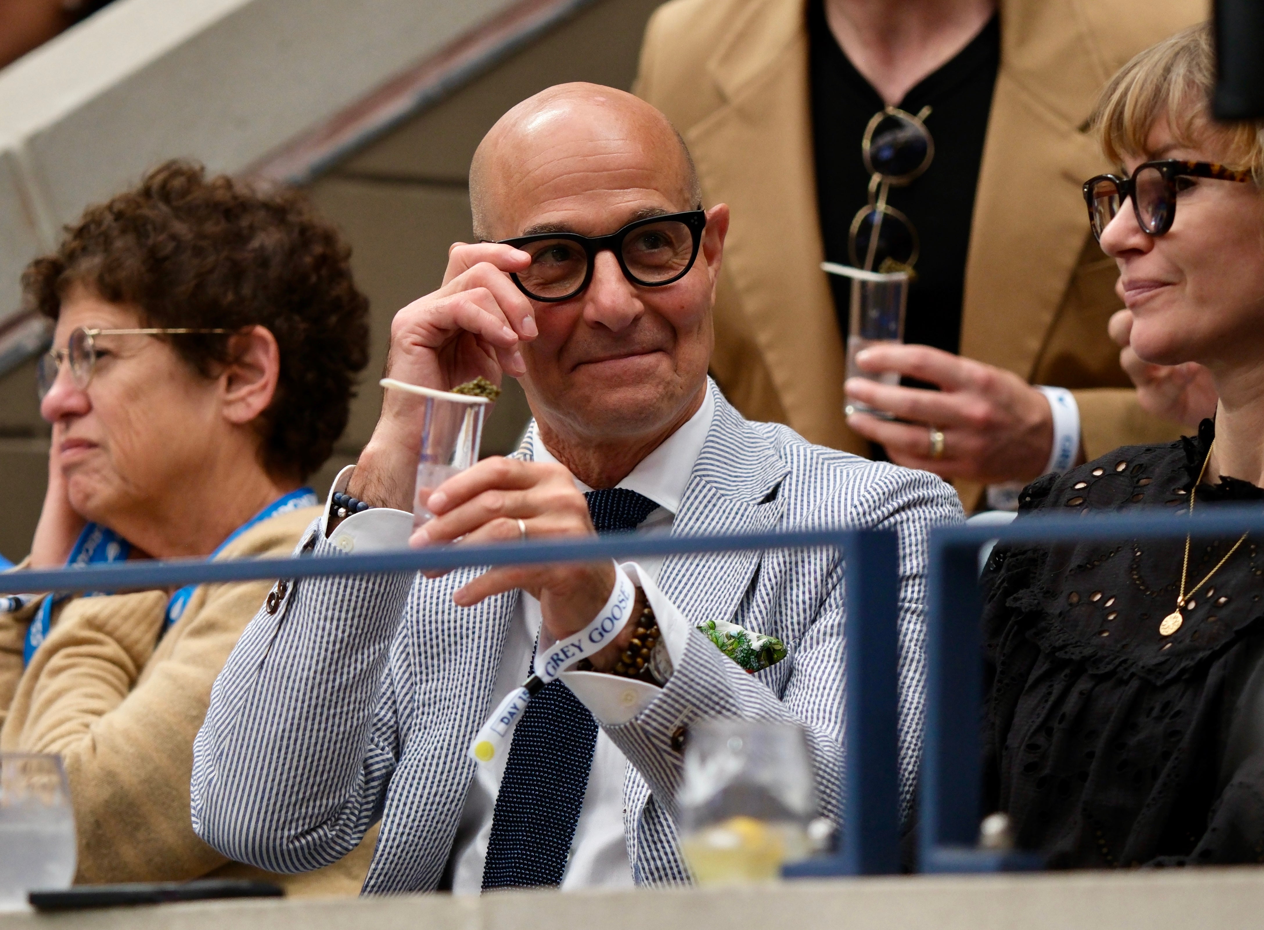 Stanley Tucci enjoys himself at the 2025 U.S. Open men's final