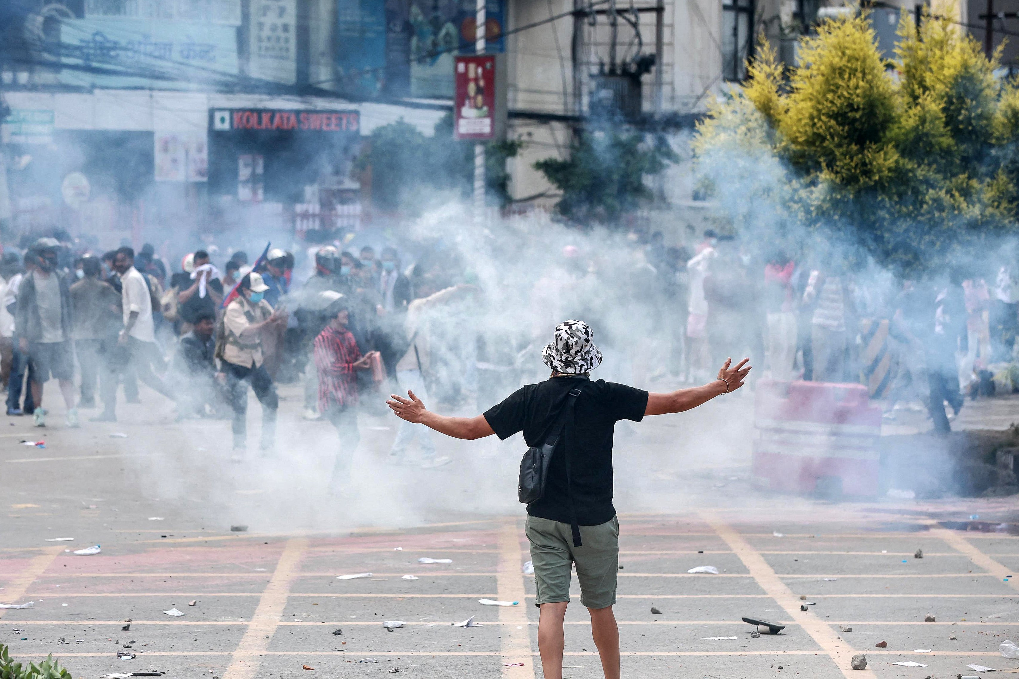 Demonstrators clash with riot police personnel during a protest outside the Parliament in Kathmandu on 8 September 2025
