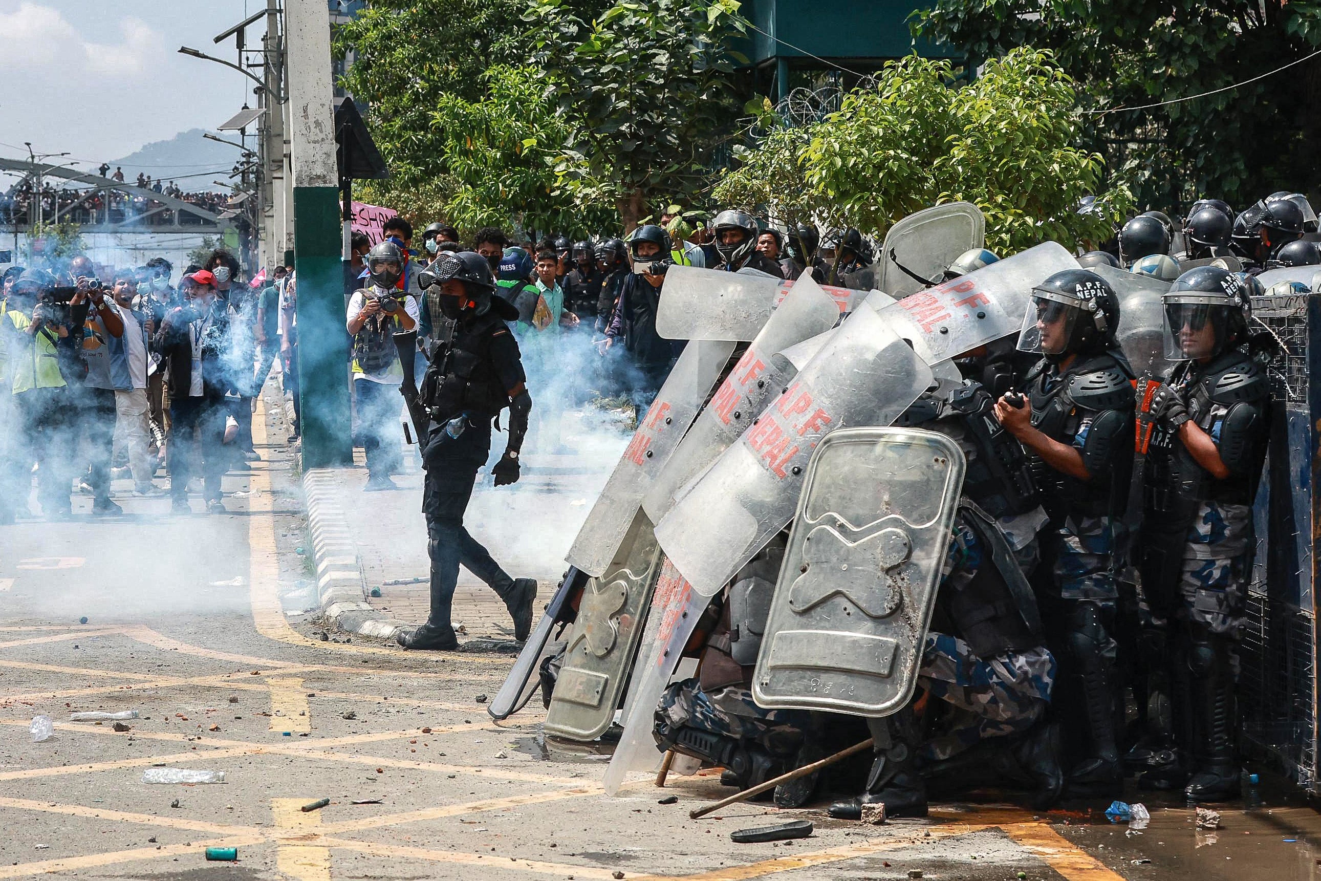 Riot police personnel stand guard during a protest outside the Parliament in Kathmandu on 8 September 2025