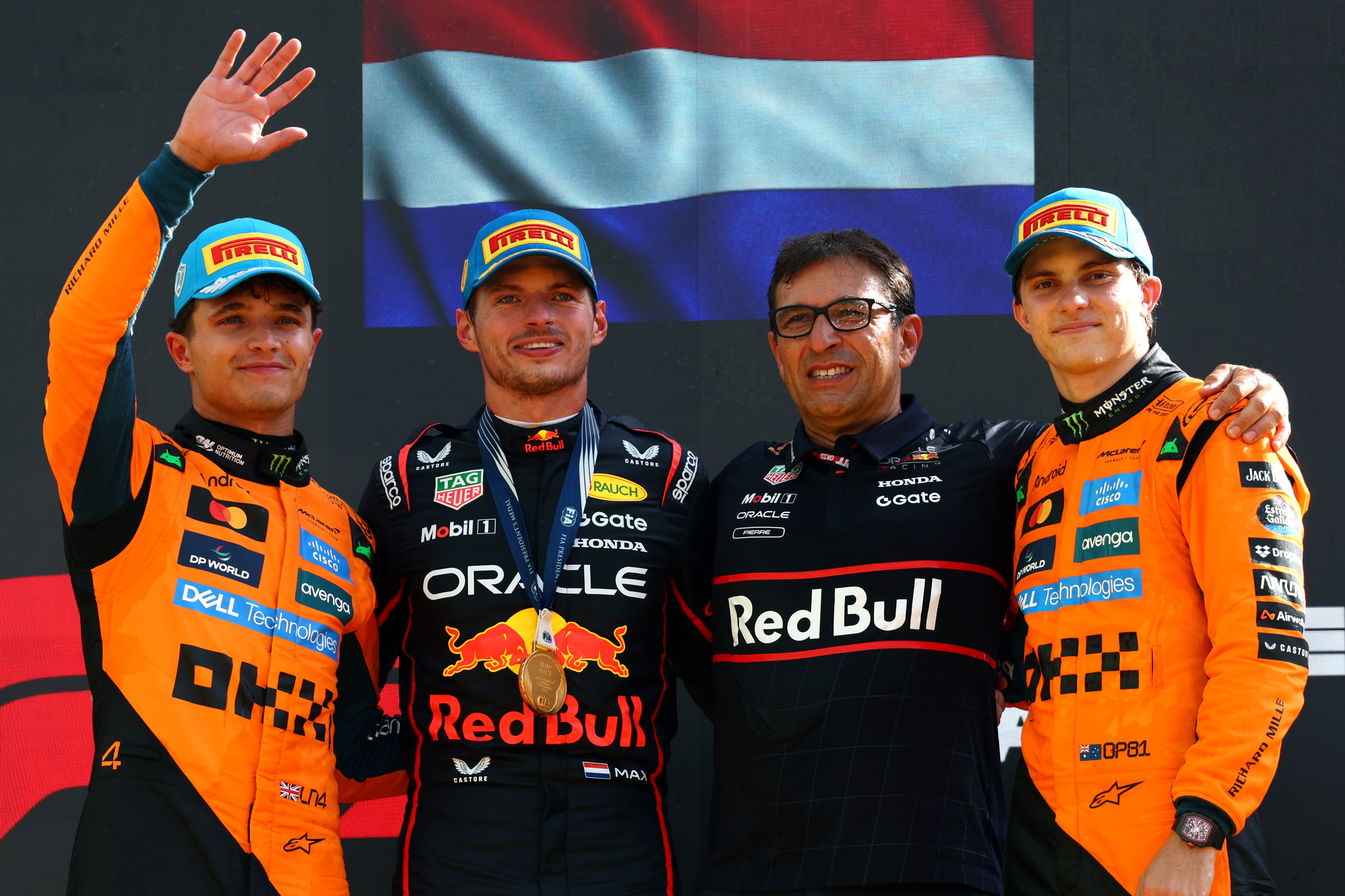 Max Verstappen (second left) chuckled when told of the development behind him