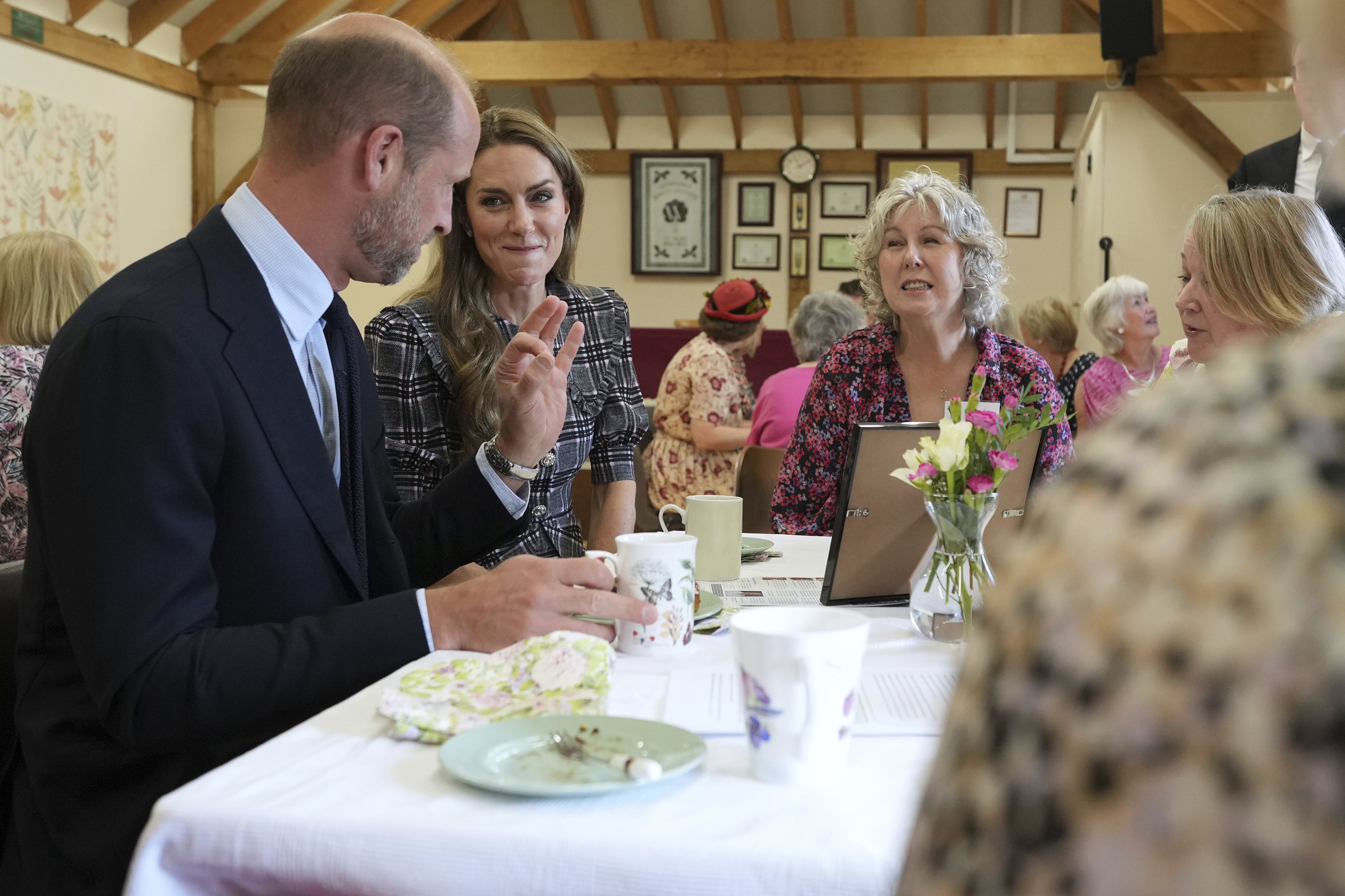 William and Kate speak to WI members during the visit in Sunningdale, Berkshire