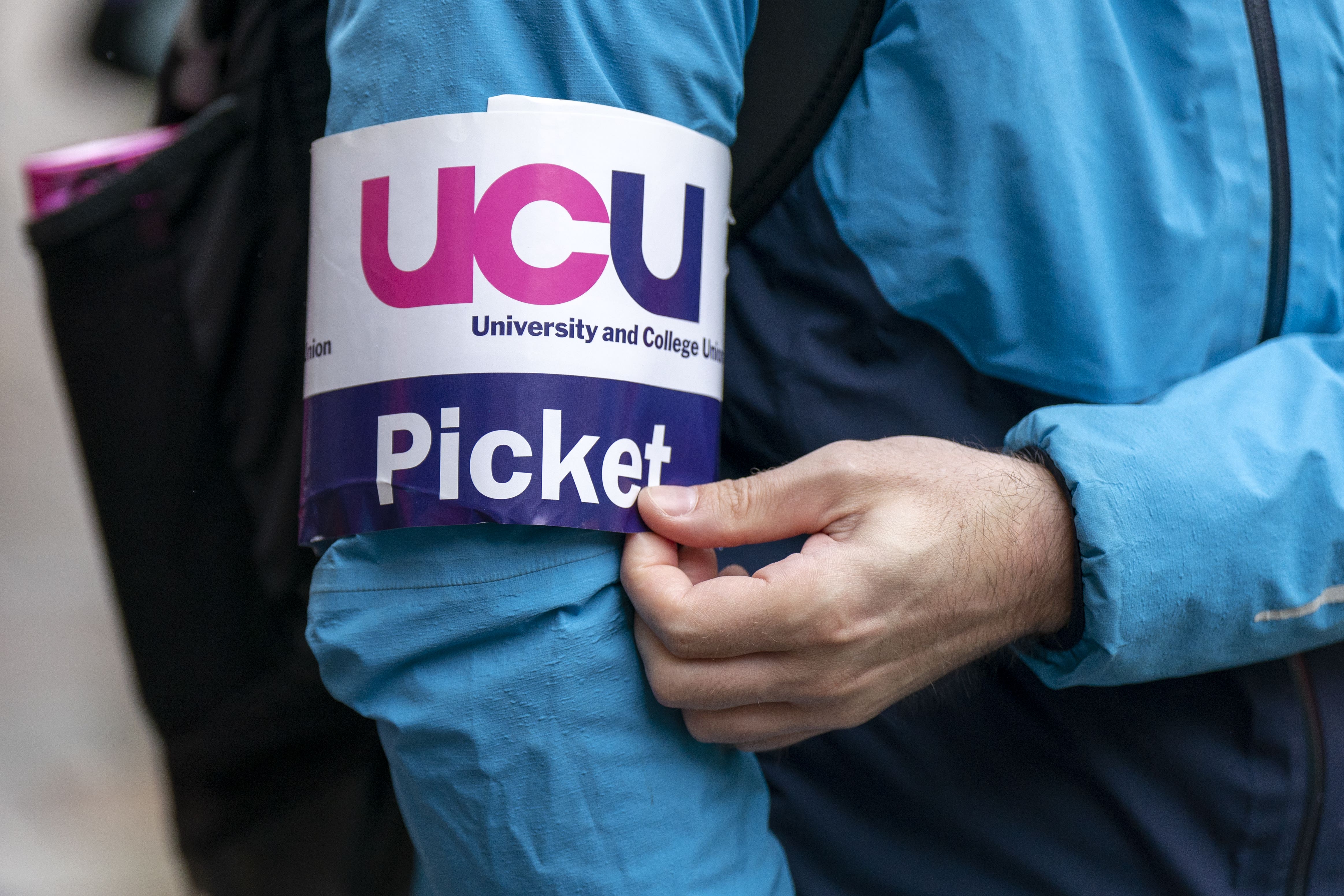 The University and College Union (UCU) is to ballot members on future strike action in a dispute over pay (Jane Barlow/PA)