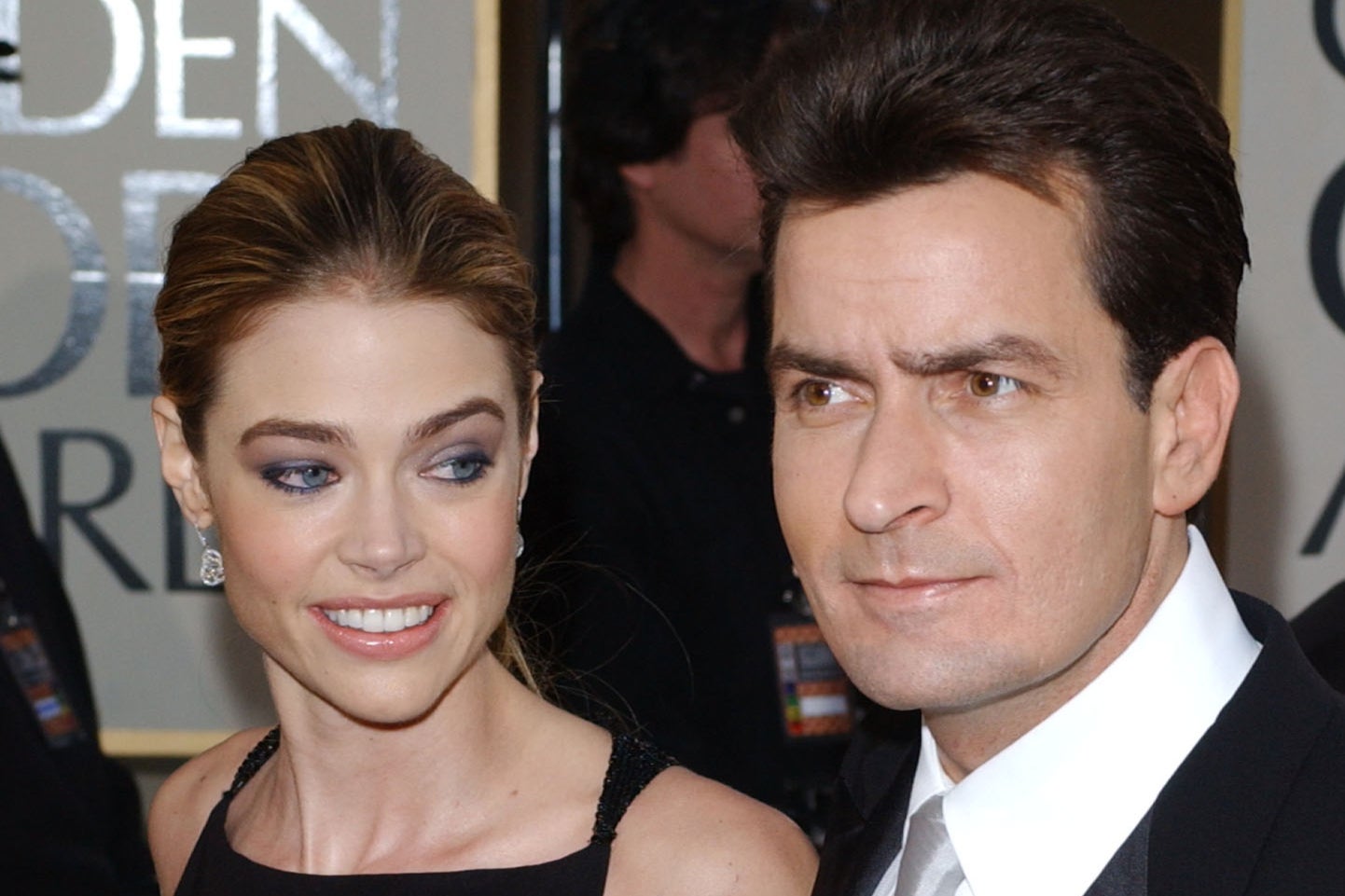 Denise Richards and Charlie Sheen attend the Golden Globes in January 2002
