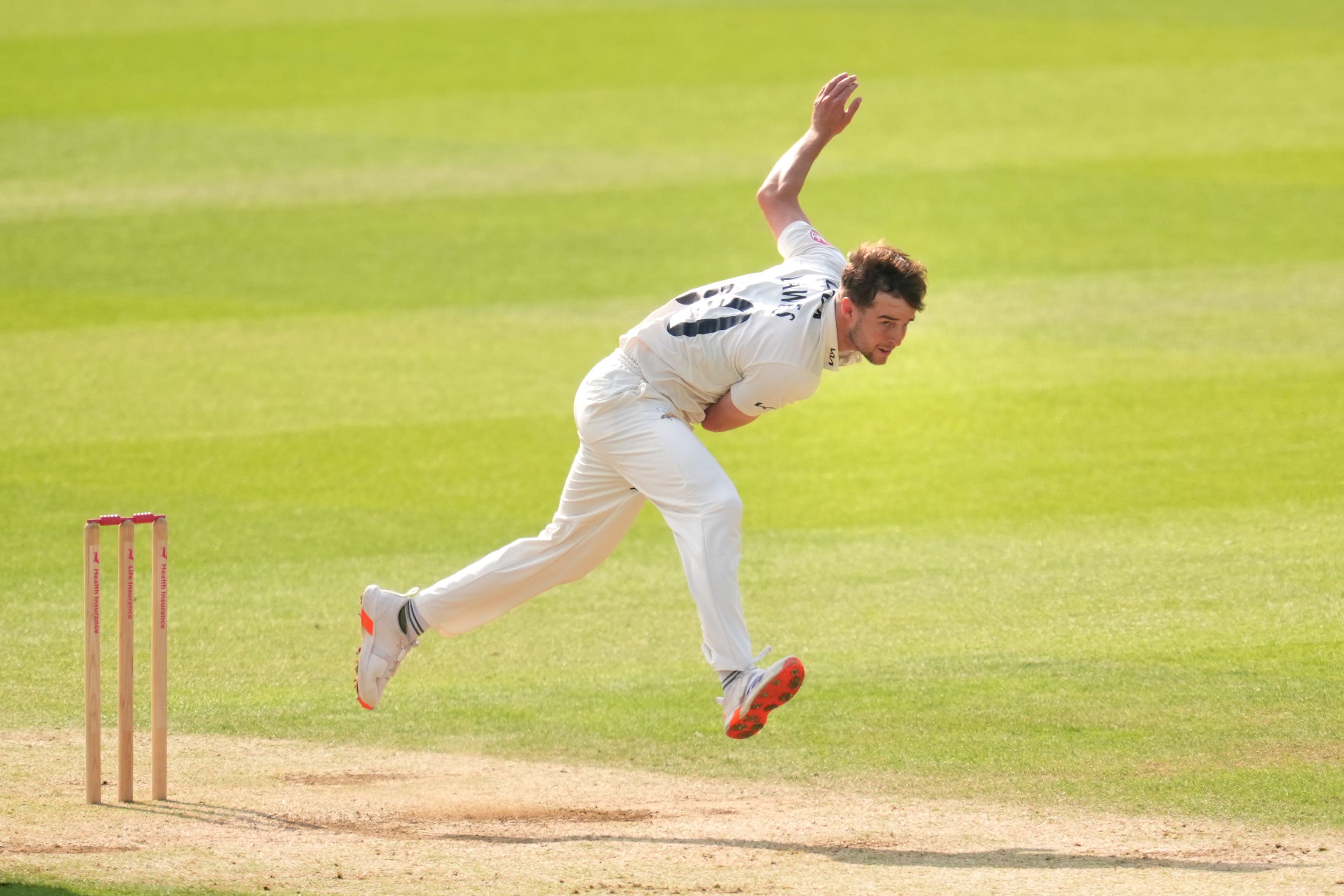 Tom Lawes, took took three wickets in a blistering five-over spell to lead Surrey’s fightback with the ball (Adam Davy/PA)