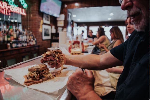 <p>The overstuffed Primanti Bros sandwich, made with pastrami or corned beef, is a symbol of Pittsburgh</p>
