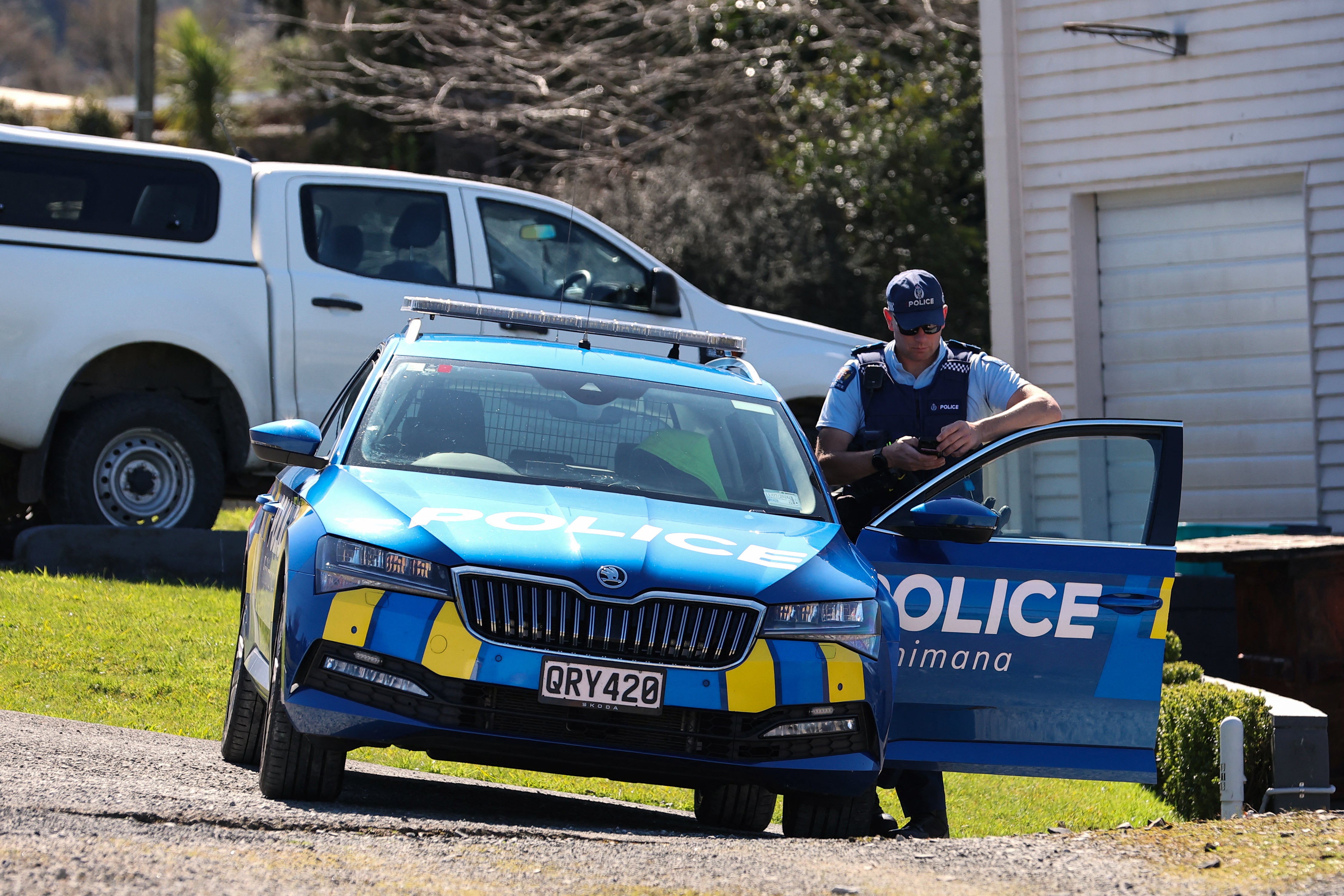 A police officer in the town of Piopio following the shoot-out