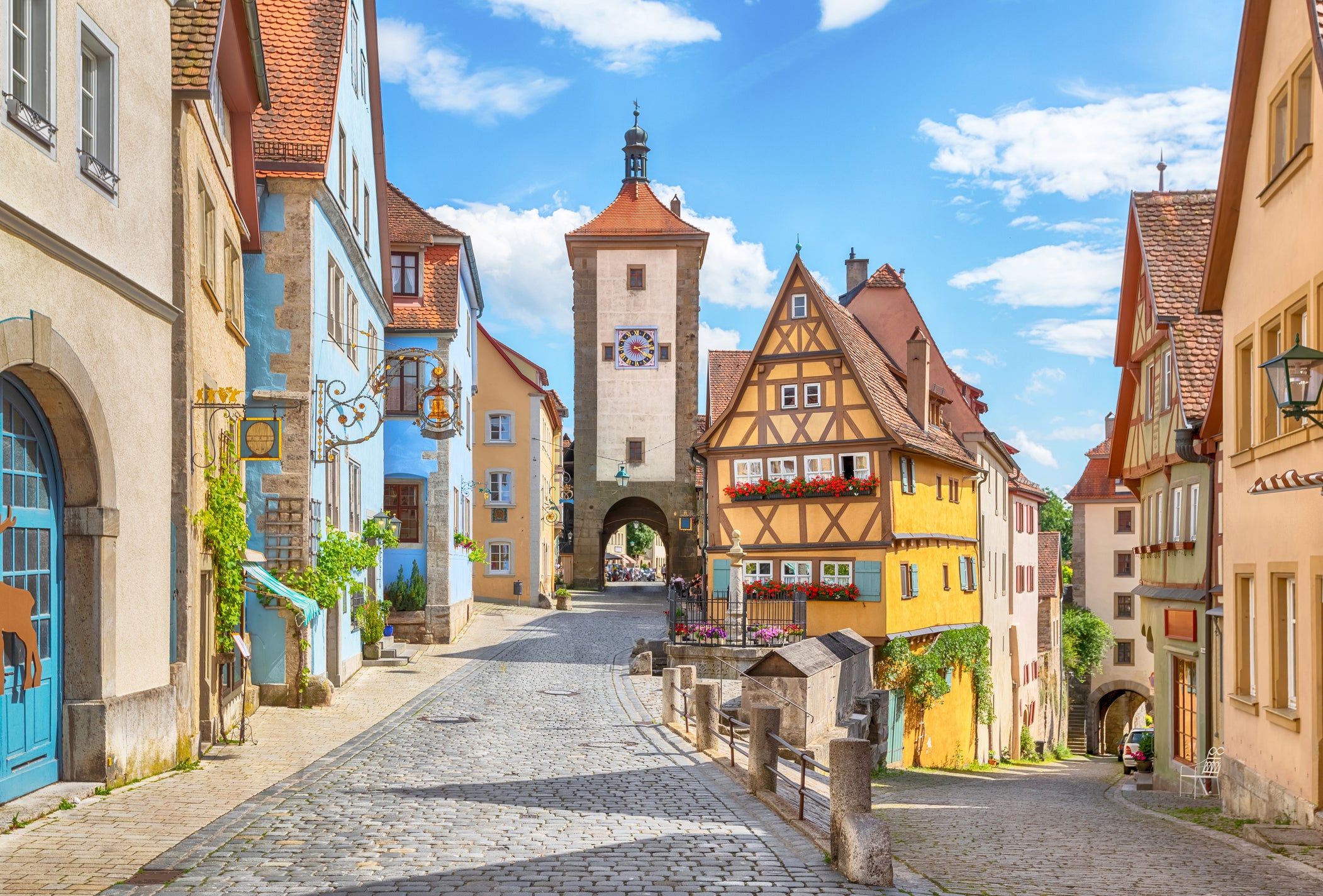 This image shows an area of Rothenburg ob der Tauber, along street Untere Schmiedgasse, which inspired Walt Disney classic Pinocchio