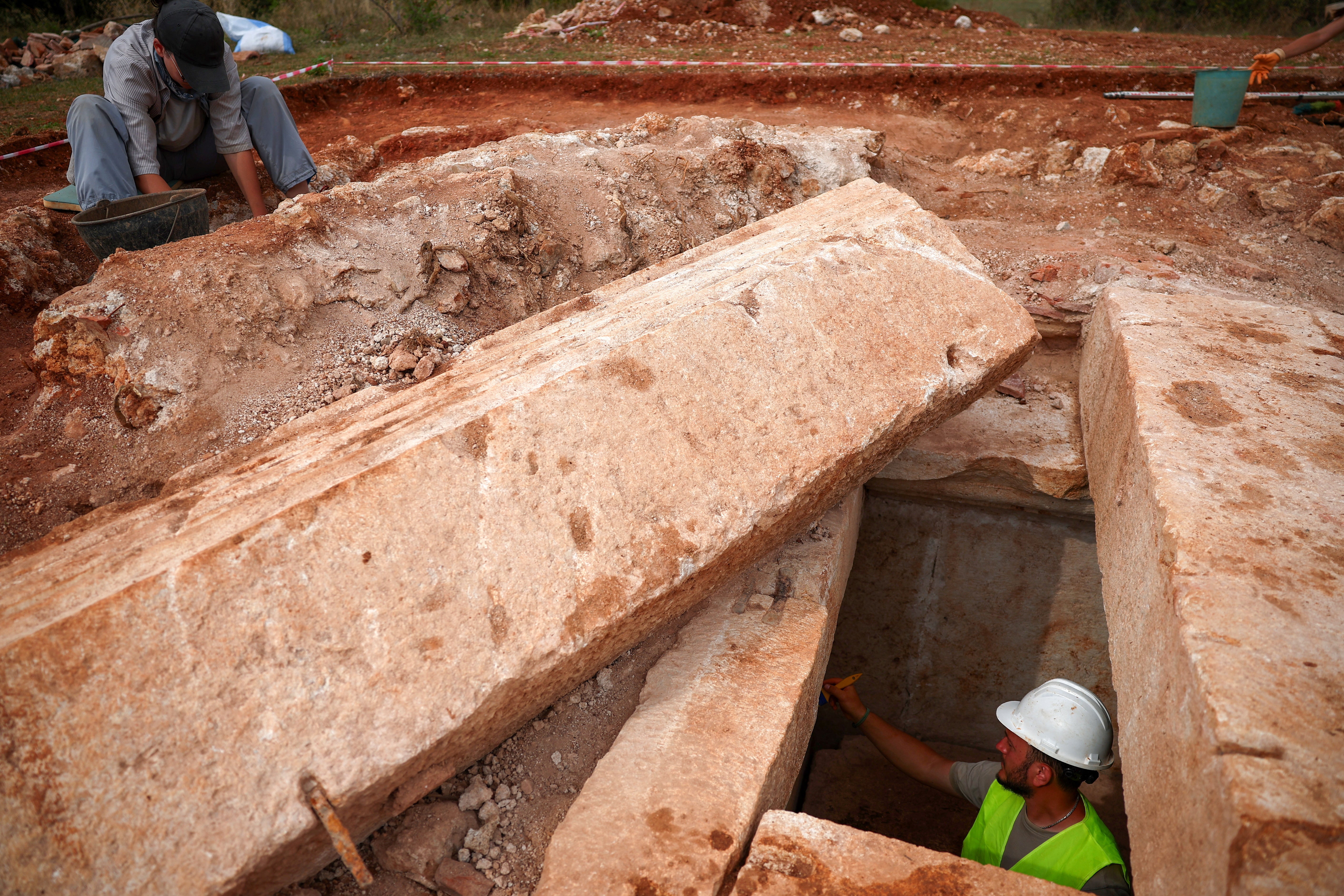 Archaeologists work on Albania's first discovered monumental tomb, which they suggest may be a mausoleum, dated to the Roman period III–IV century AD, in Strikcan, Albania, September 4, 2025. REUTERS/Florion Goga
