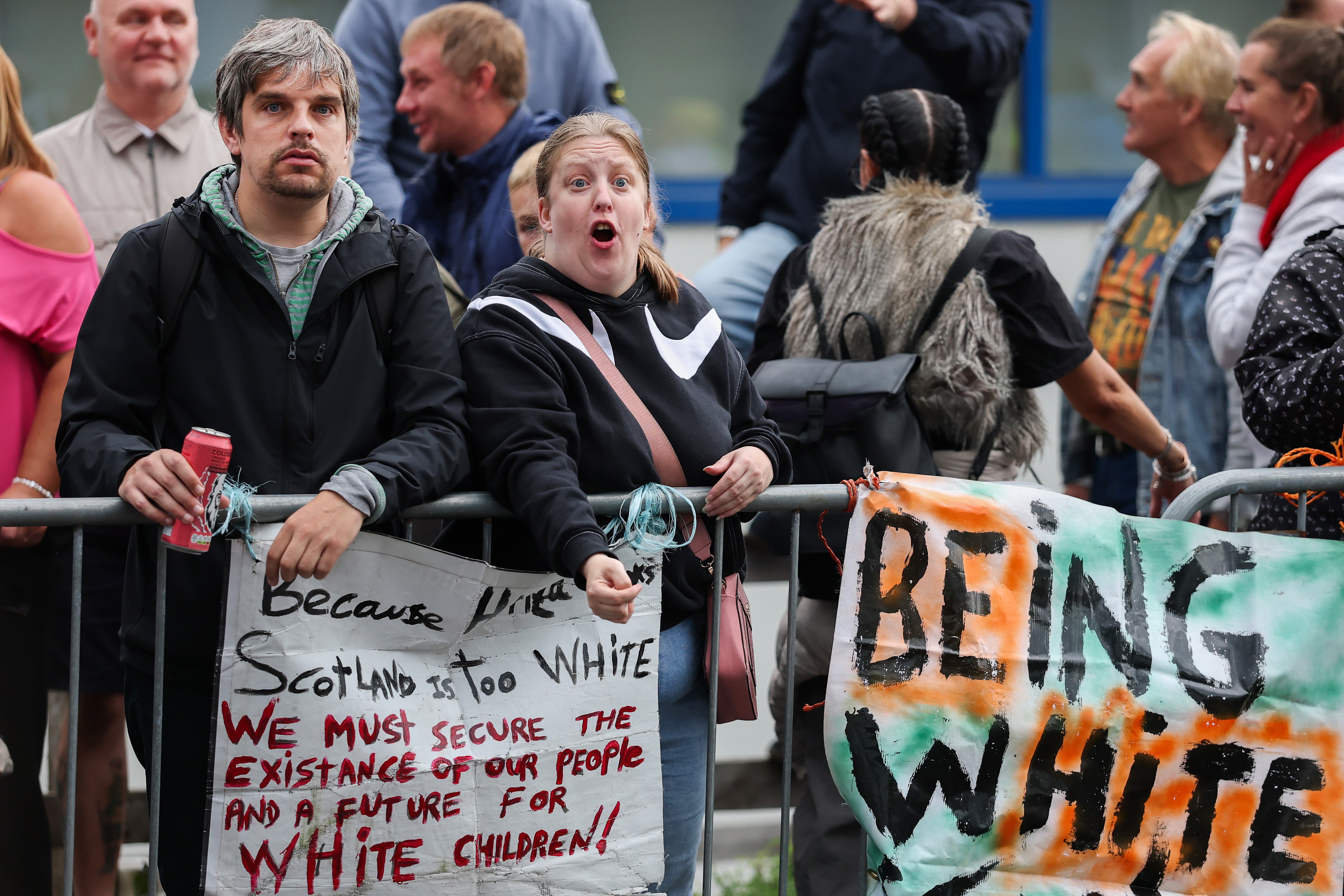 Anti-migrant protesters demonstrate outside the Cladhan Hotel in Falkirk, Scotland