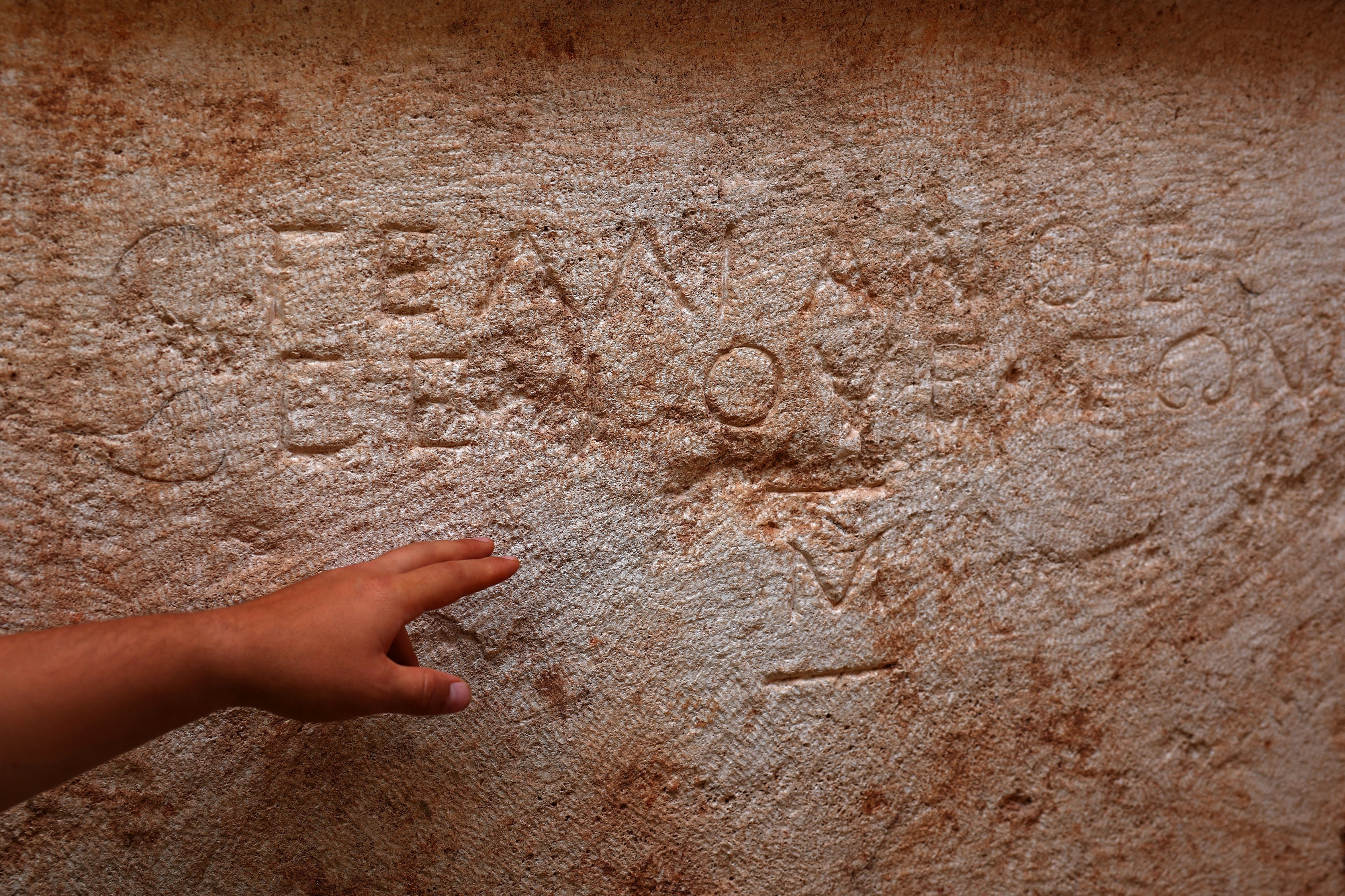 Erikson Nikolli, an archaeologist, gestures as he with his colleagues work on Albania's first discovered monumental tomb, which they suggest may be a mausoleum, dated to the Roman period III–IV century AD, in Strikcan, Albania, September 4, 2025. REUTERS/Florion Goga