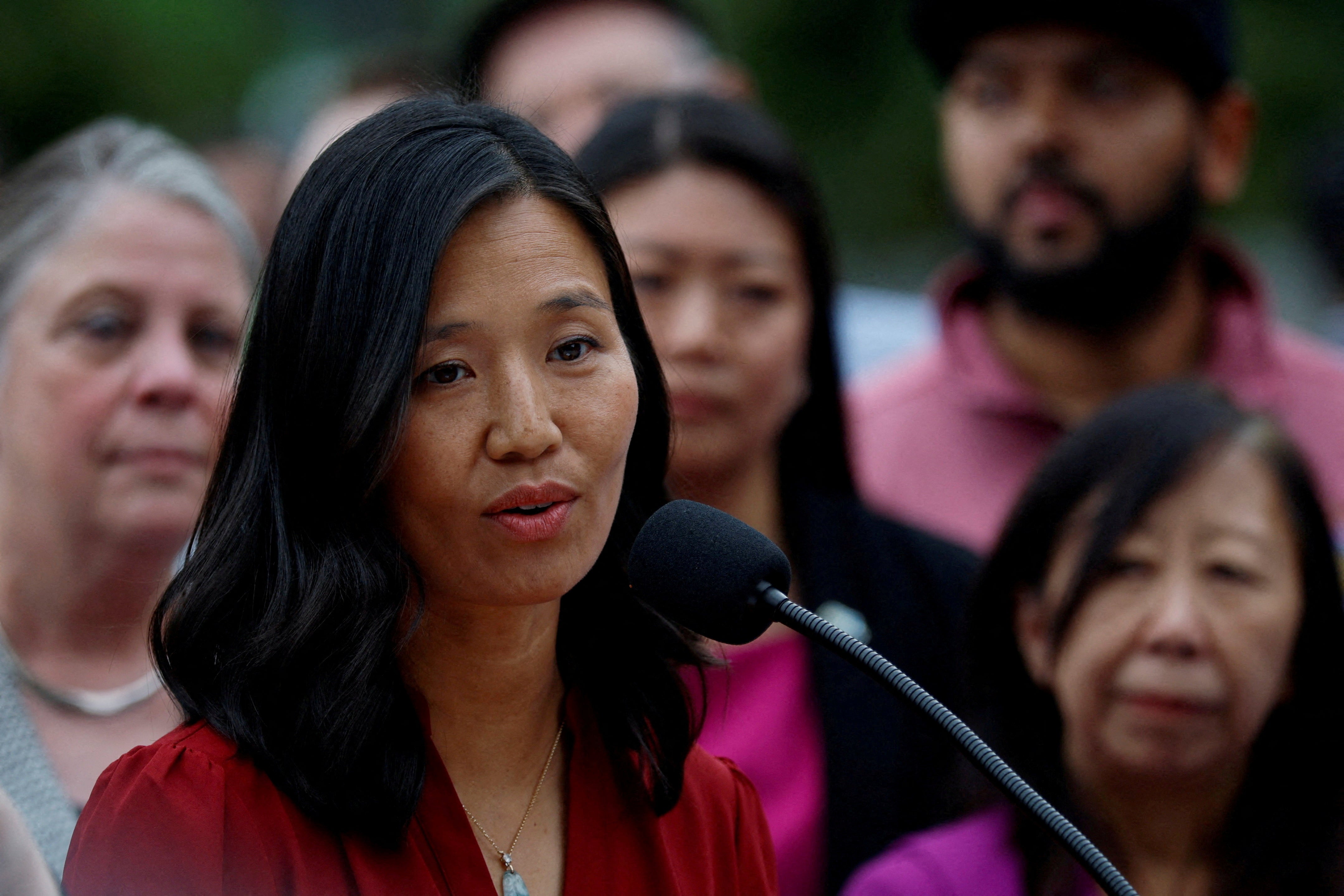 Boston Mayor Michelle Wu speaks out against Trump administration pressure for her city to give up its 'sanctuary' protections at a public press conference on August 19 2025