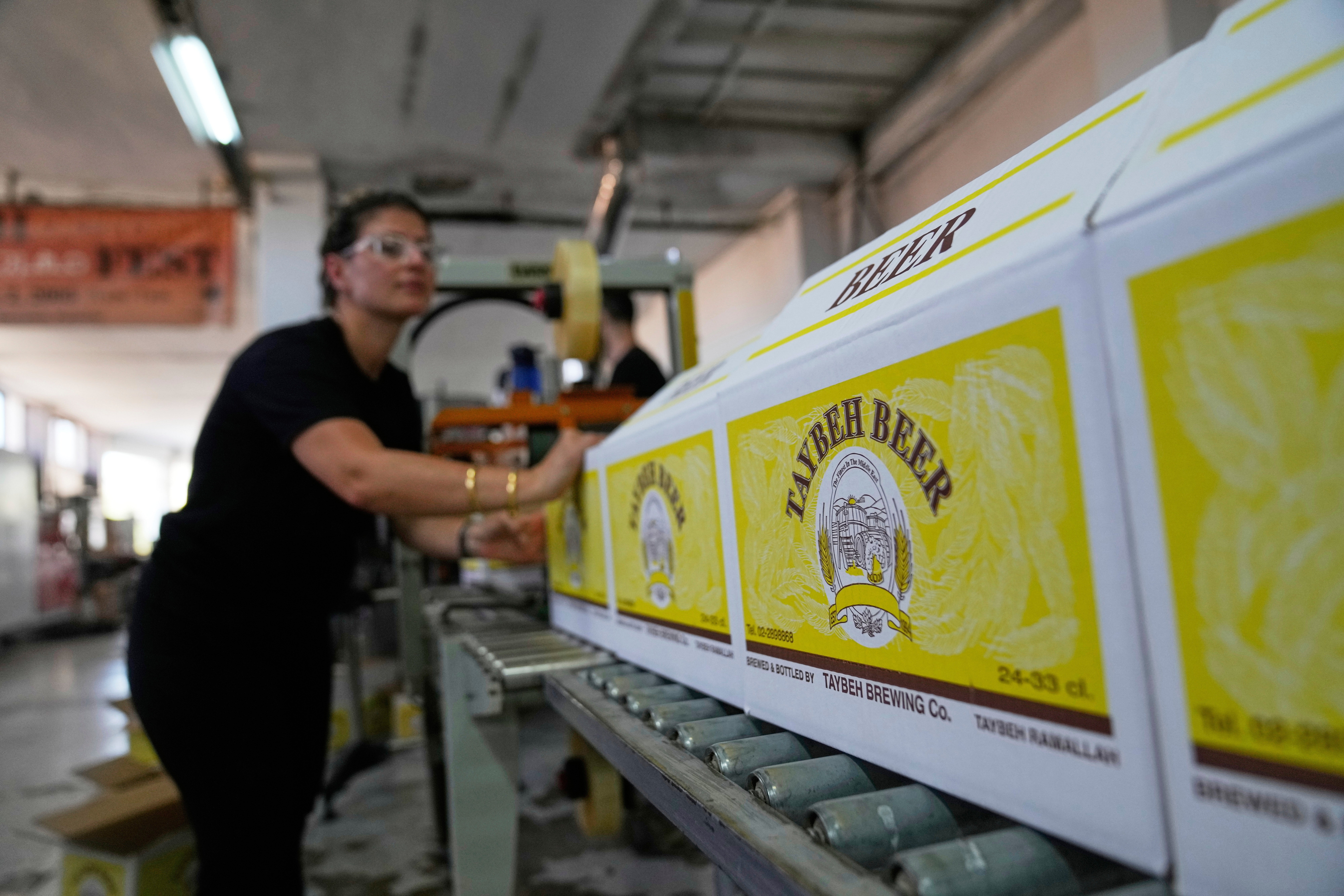 Nadin Khoury on the Taybeh production line