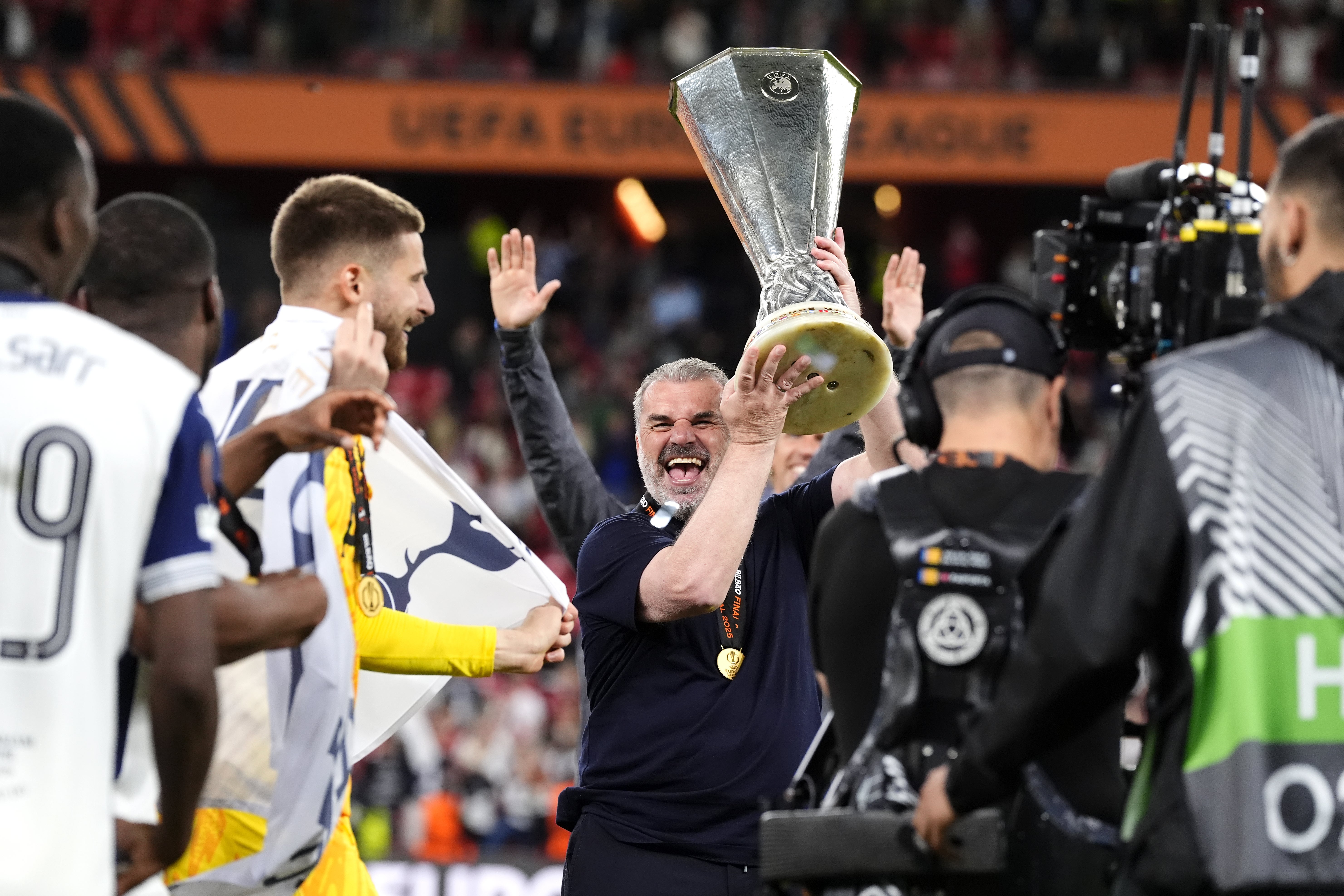 Ange Postecoglou (centre) celebrated winning the Europa League with Tottenham last season (Nick Potts/PA)