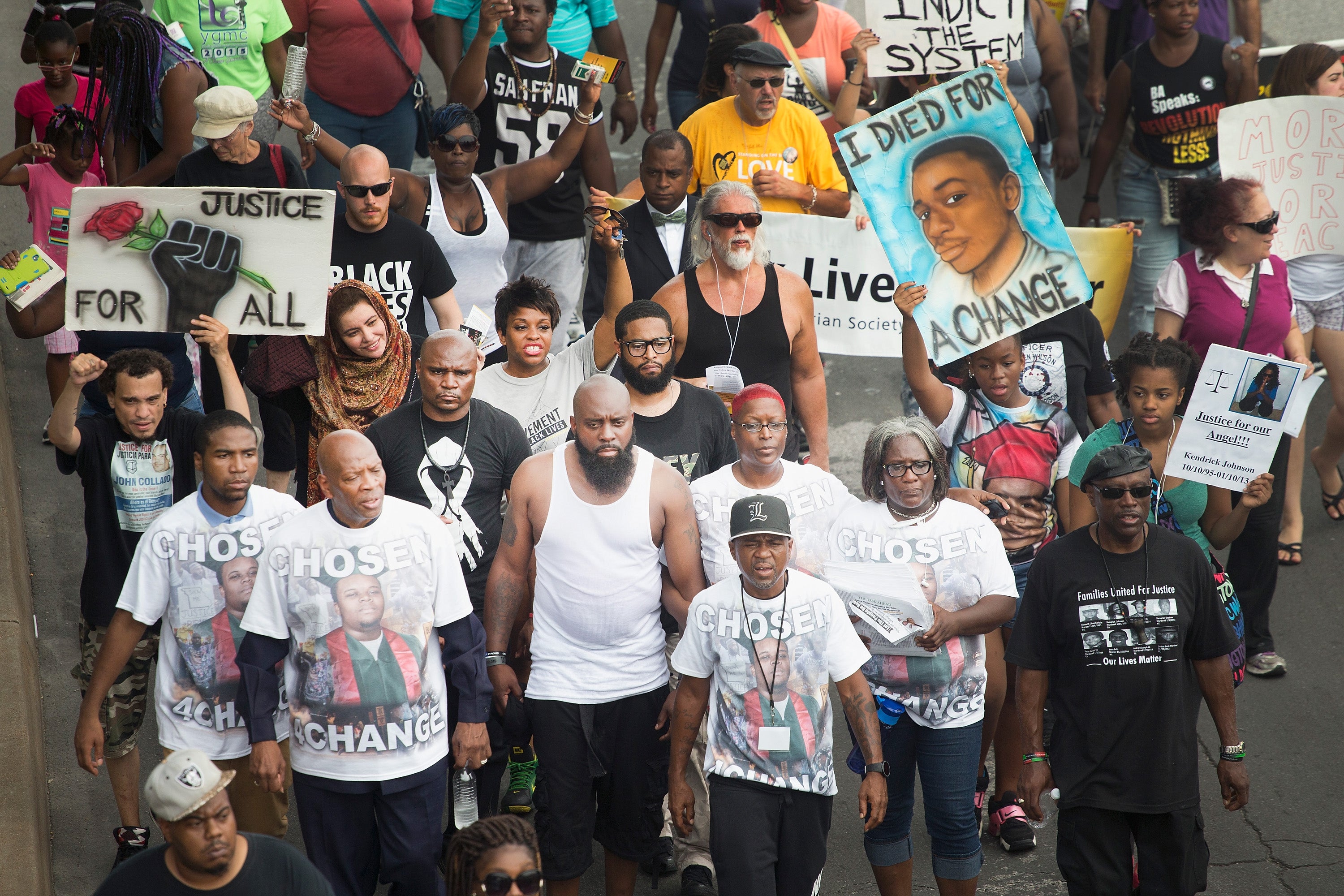 Michael Brown Sr. (center) led a march for his son Michael Brown Jr. on August 8, 2015