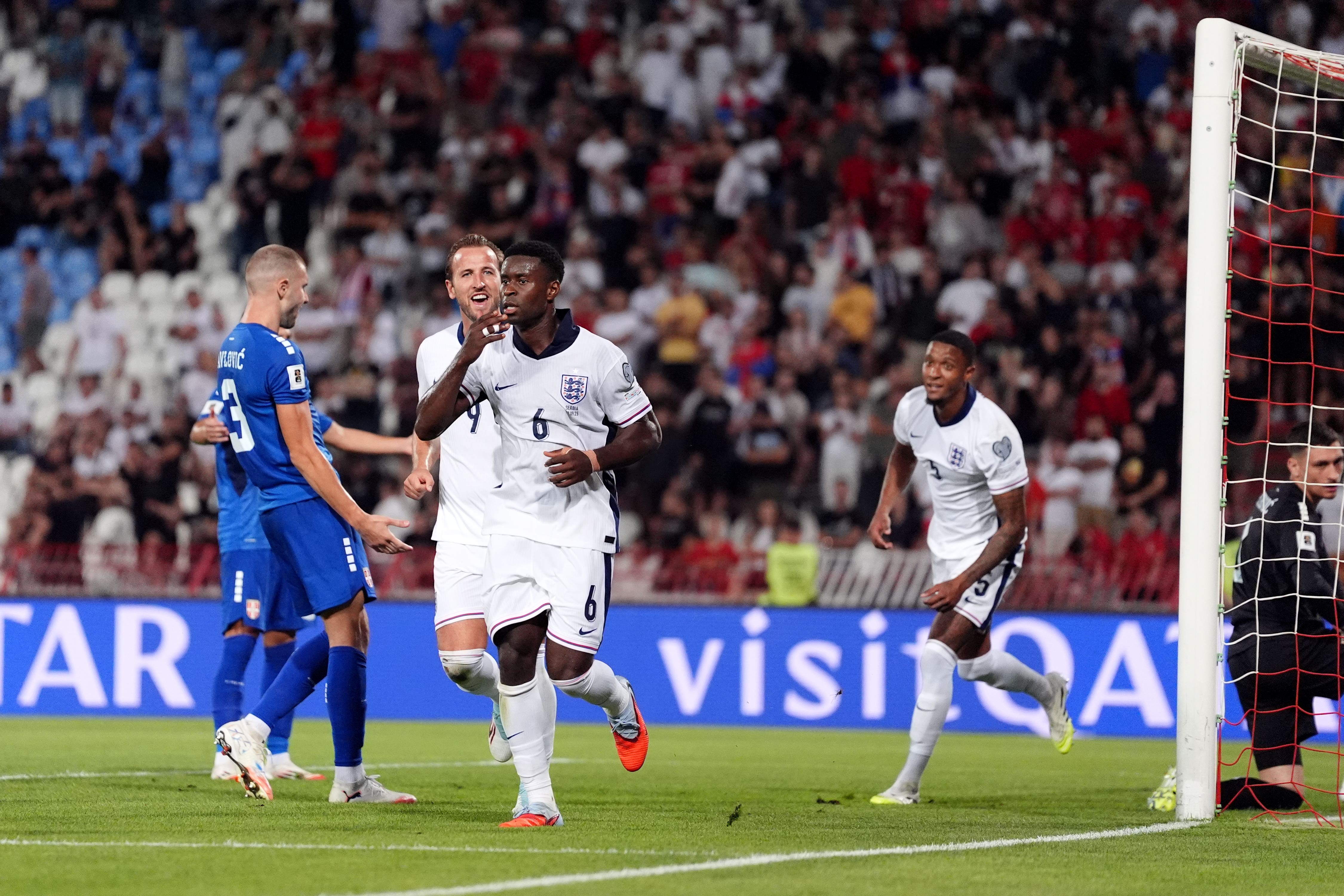Marc Guehi celebrates scoring against Serbia