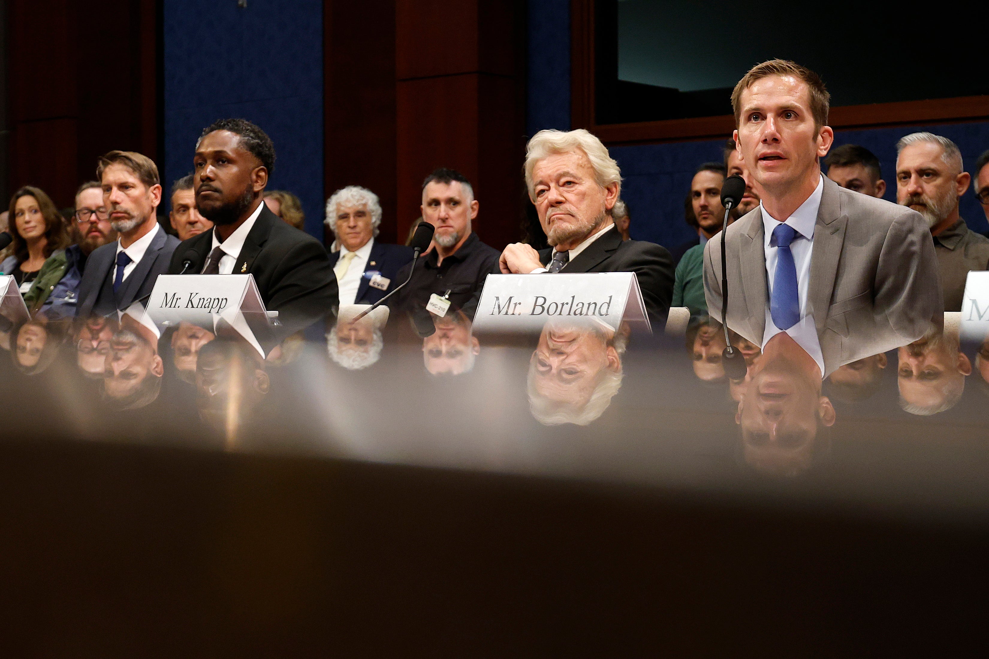 Air Force veterans Jeffrey Nuccetelli and Dylan Borland, as well as Navy veteran Alexandro Wiggins, spoke at the hearing, along with journalist George Knapp, a prominent figure in the UFO disclosure community