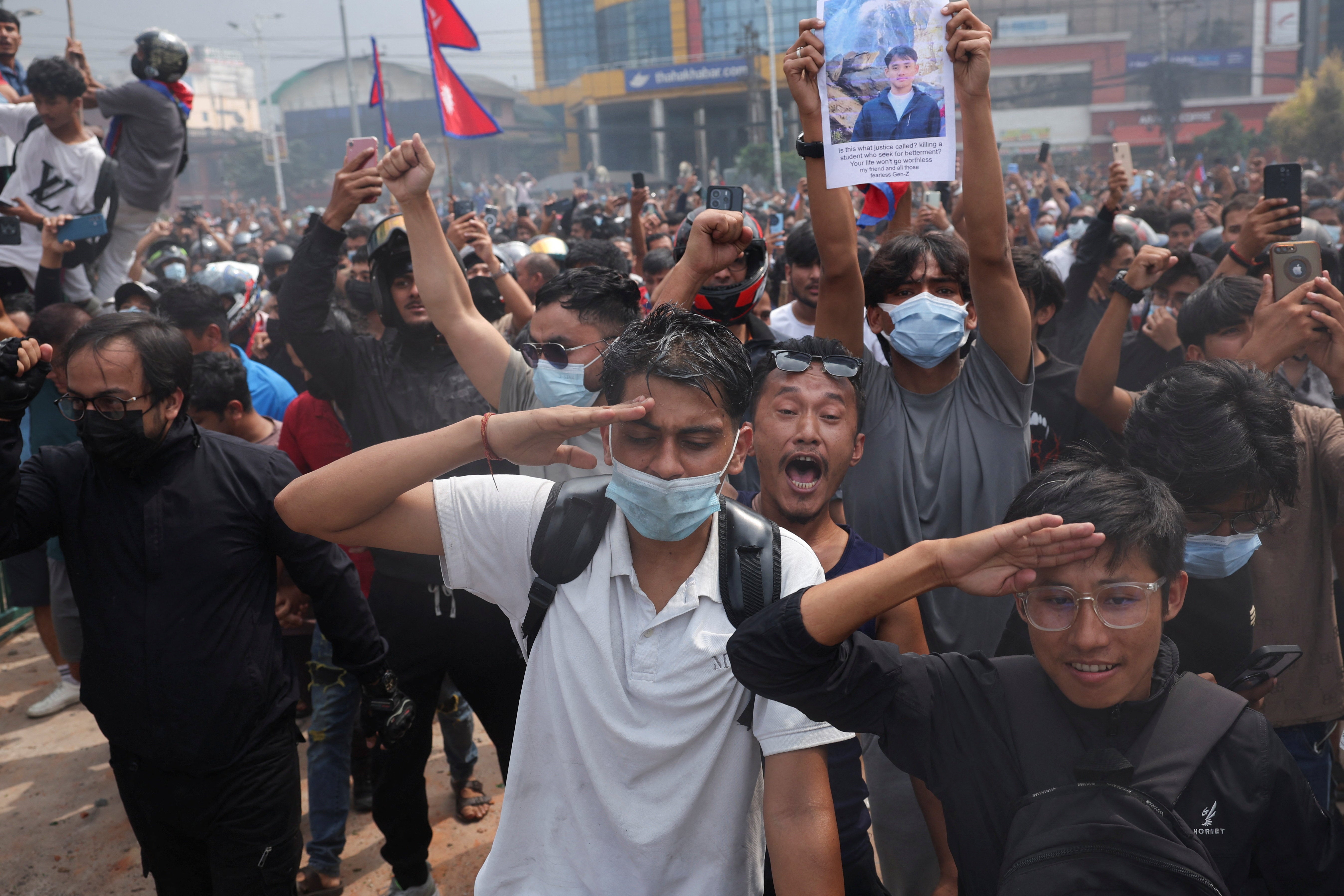Demonstrators enter the Parliament complex during a protest against Monday's killing of 19 people after anti-corruption protests